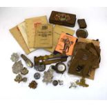 A group of military collectables including a 1915 Cruchon Emons compass,