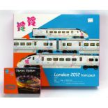 A Hornby OO gauge train pack R2961 'London 2012', together with an Olympic Stadium,