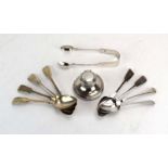 A silver capstan-type inkwell, eight silver teaspoons and a pair of silver sugar nips,