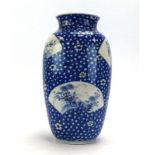 A Japanese blue and white vase of ovoid form decorated with fans within a blossom type ground, h.
