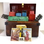 A group of Hornby and Meccano O gauge accessories including a motor, a digger bucket, a transformer,