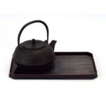 A Nanbu Tekki Japanese iron teapot, mark to base 'Tekki nolppin',