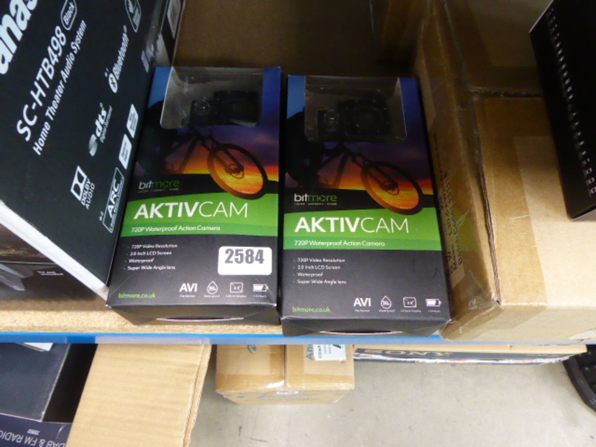 720p action cameras in boxes