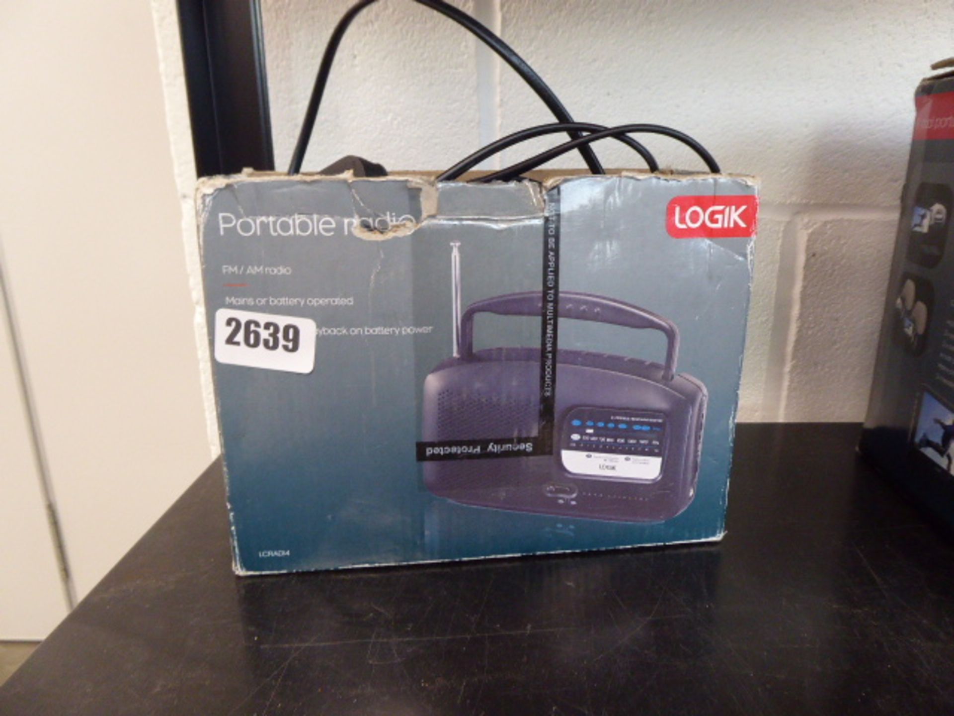 2779 Logic portable radio in box