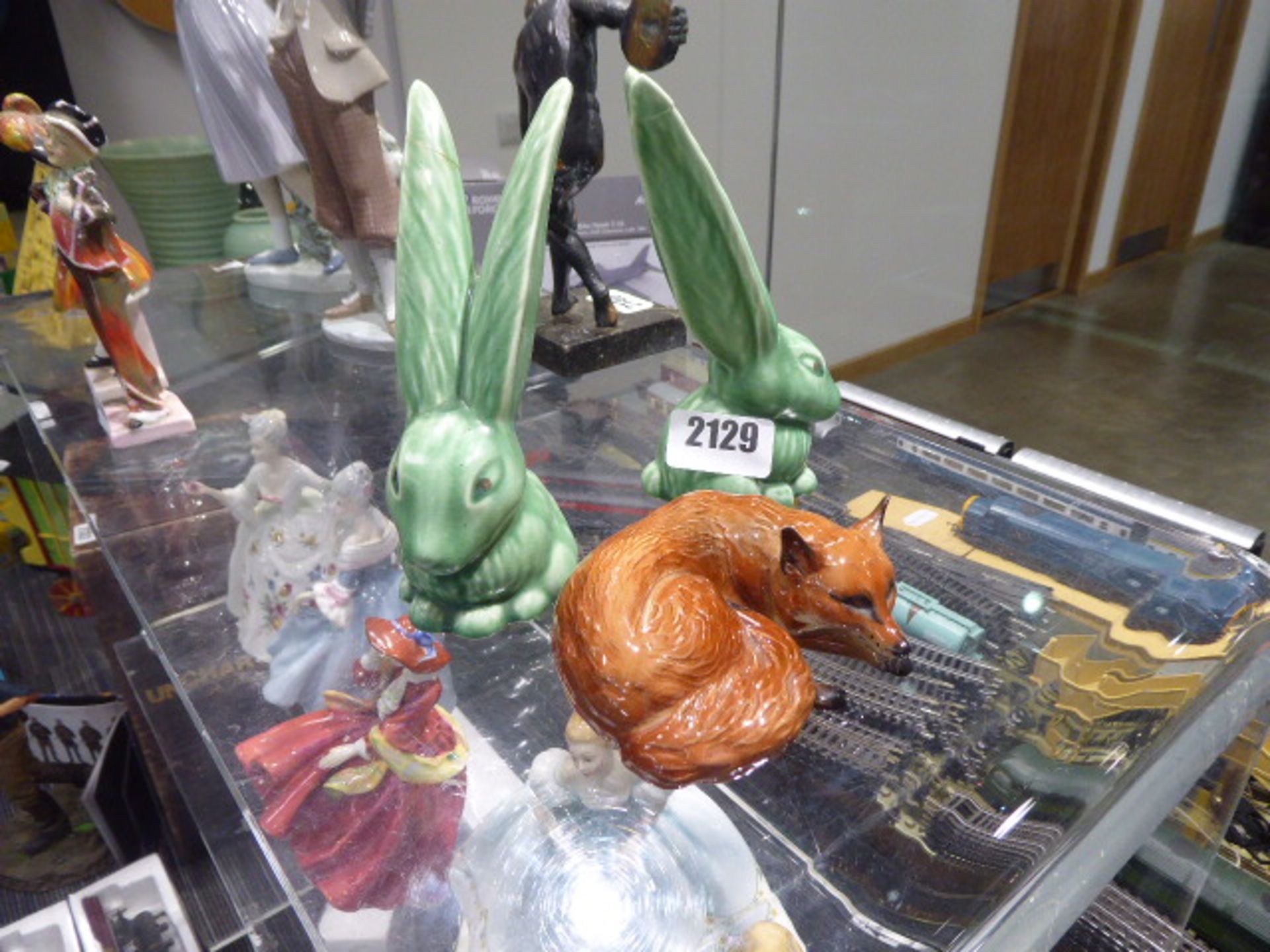 Beswick fox figure and 2 Sylvac rabbits