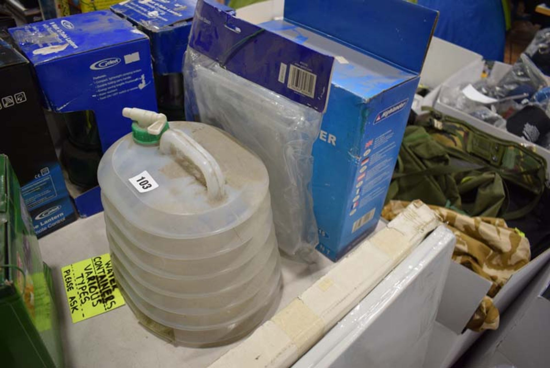 Two water containers and a Gelert folding wash basin