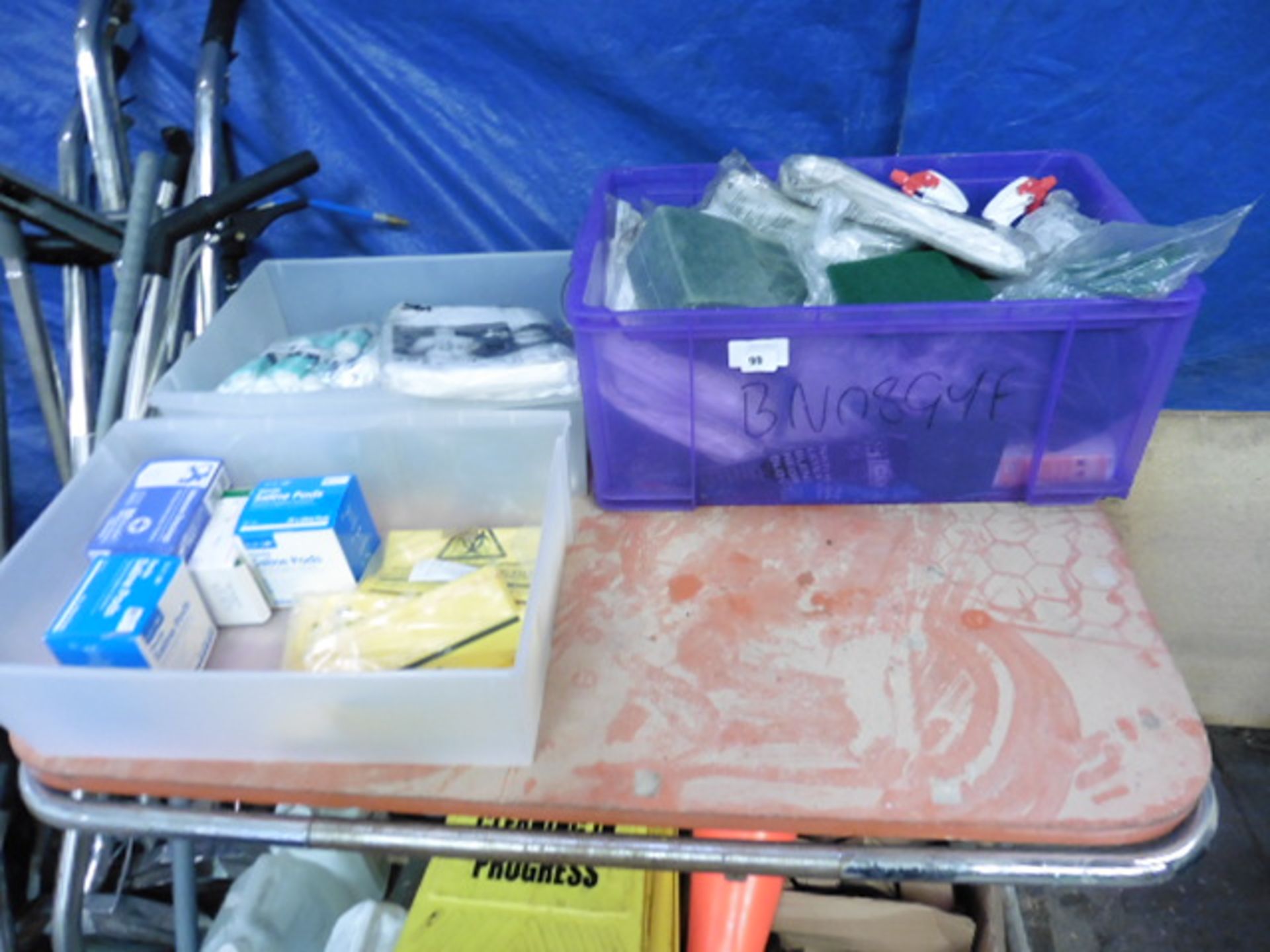 3 trays of various cleaning consumables incl. scouring pads, disposable overalls, etc.