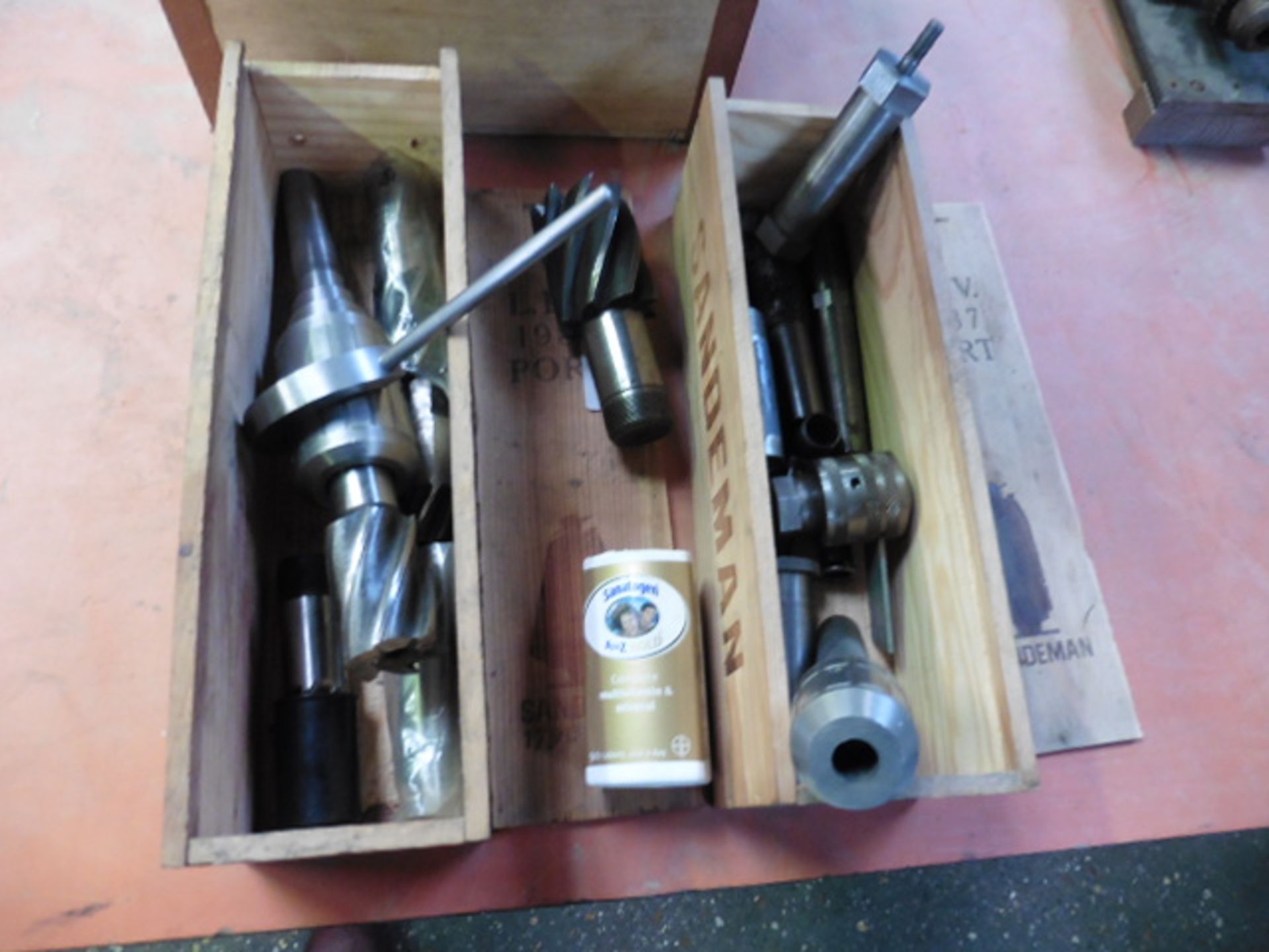 2 small wooden boxes of milling tooling