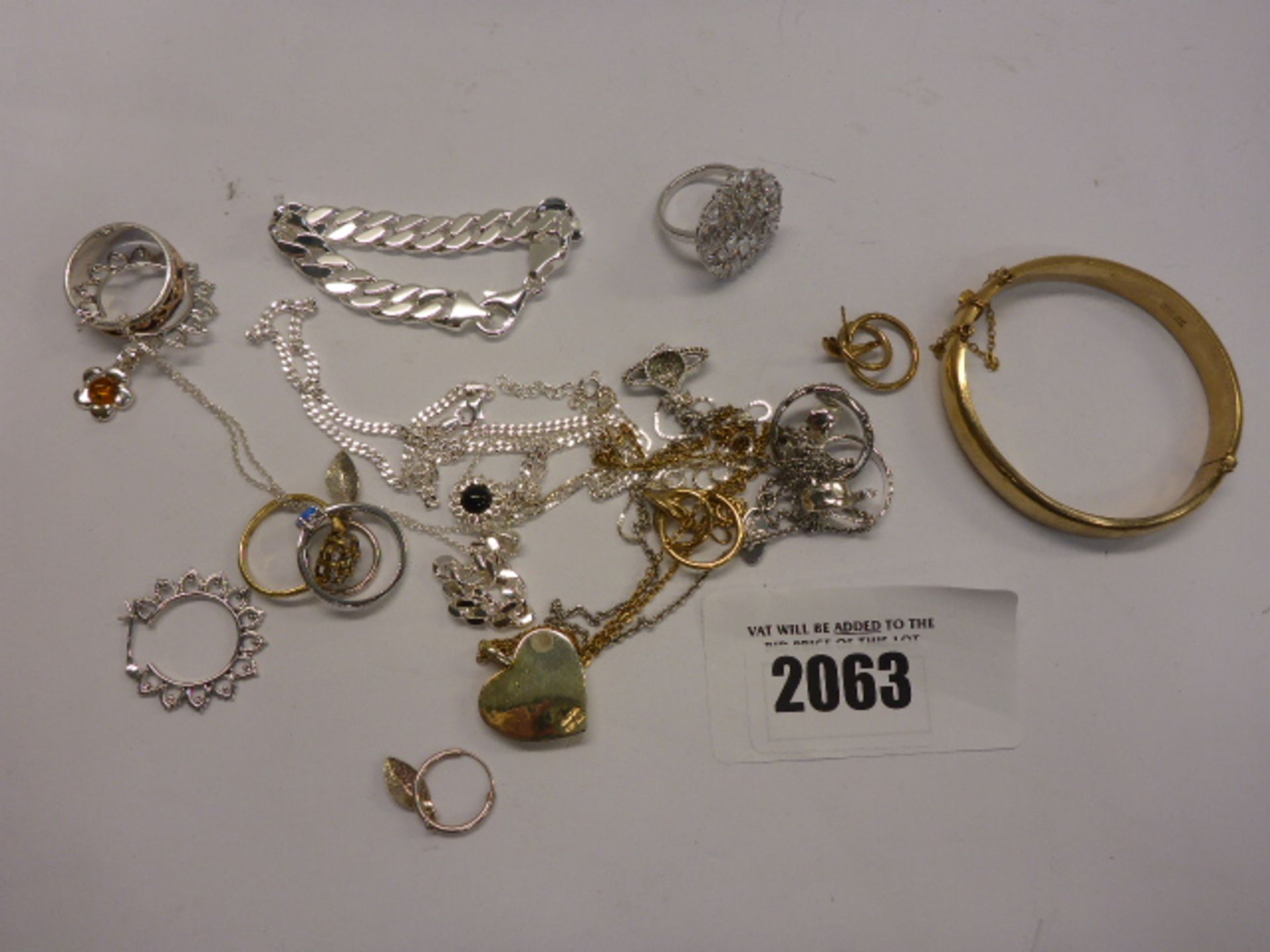 Quantity of white metal and yellow metal jewellery; rings, bangle, chains etc