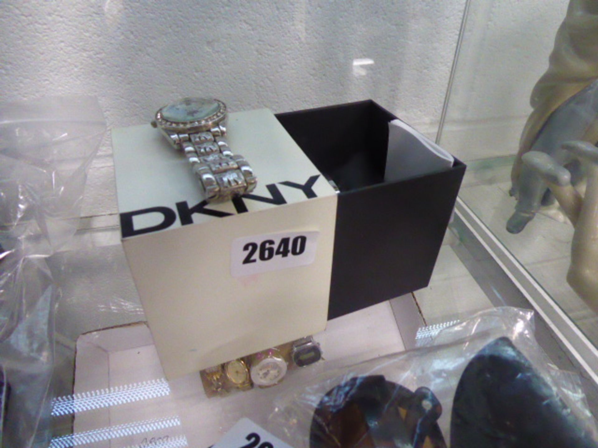 DKNY stainless steel strapped wrist watch with another