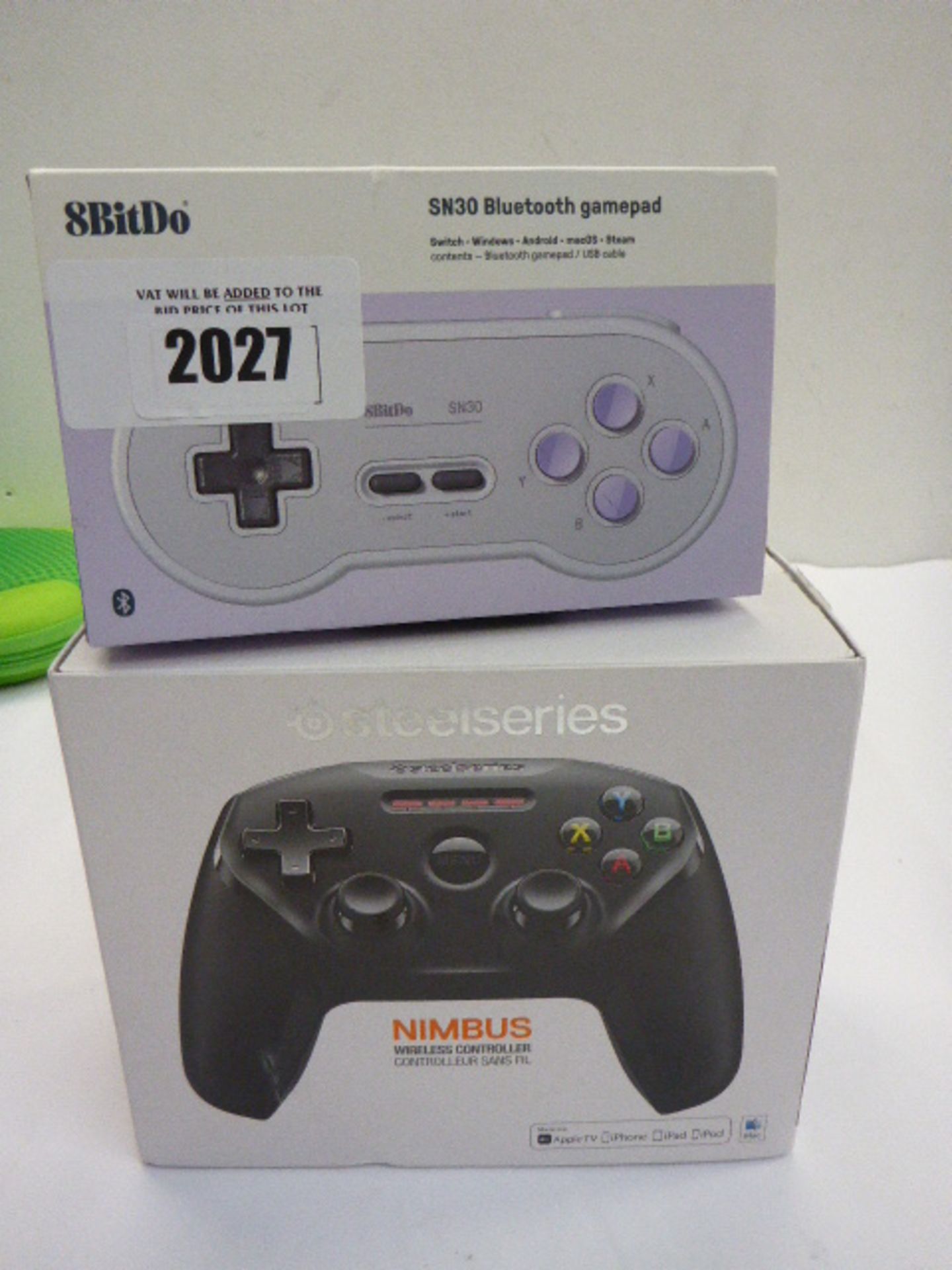 8BitDo SN30 bluetooth gamepad with Steelseries Nimbus wireless controller