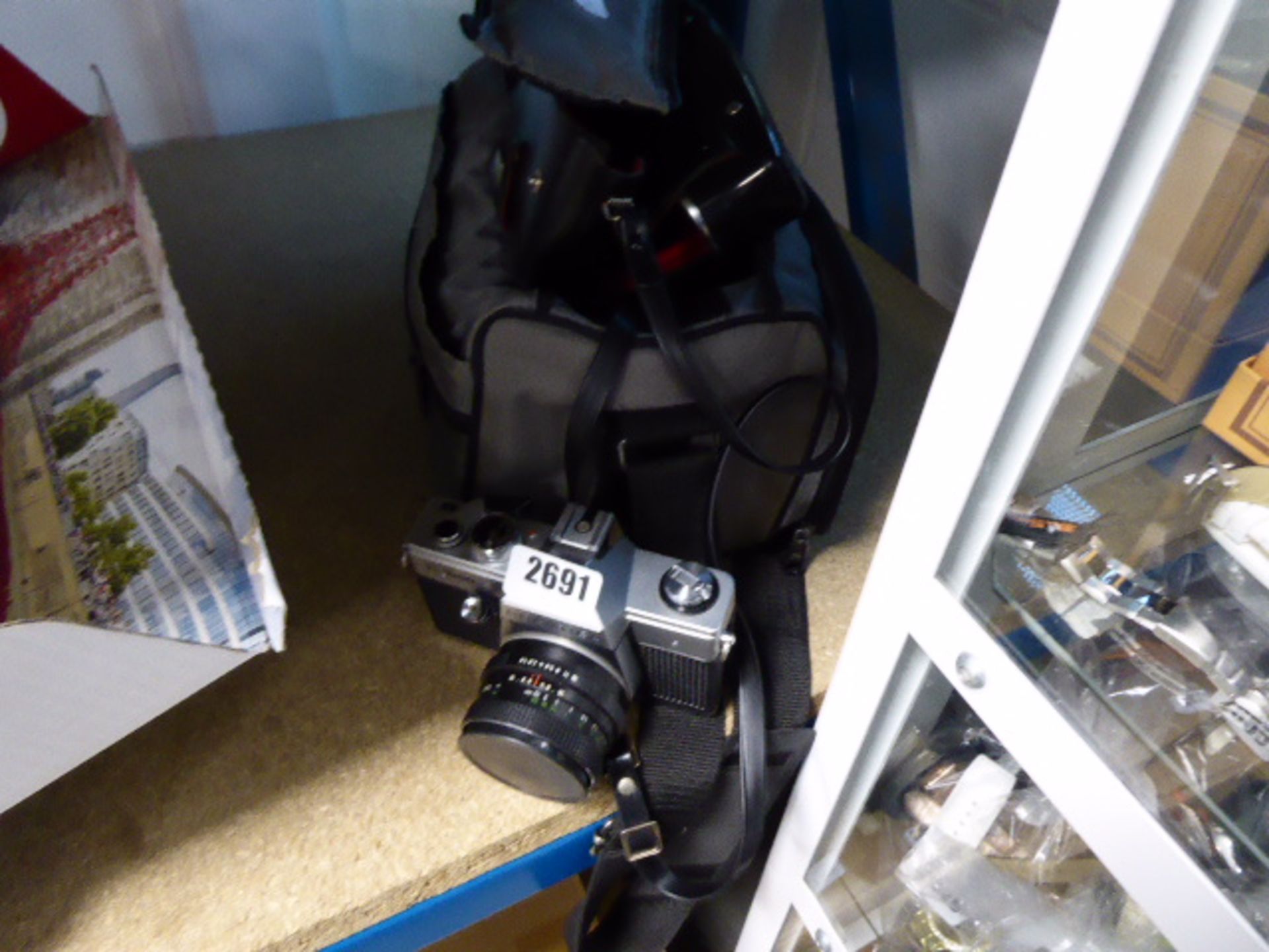 Practika Super TL21000 film camera with accessories in bag