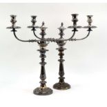 A pair of early/mid 20th century silver plated three branch candelabra, h. 45.