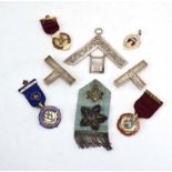 A group of Masonic regalia comprising three silver and enamelled 'Jewels'/medallions,