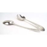 A pair of George III silver old English pattern table spoons with wrigglework decoration,