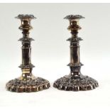 A pair of Sheffield plate telescopic candlesticks of knopped foliate design,
