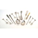 A mixed parcel of silver comprising a glass handled salad spoon, a fiddle pattern table spoon,