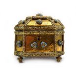 A French gilt metal casket of canted square form with turquoise knotted roundel's,