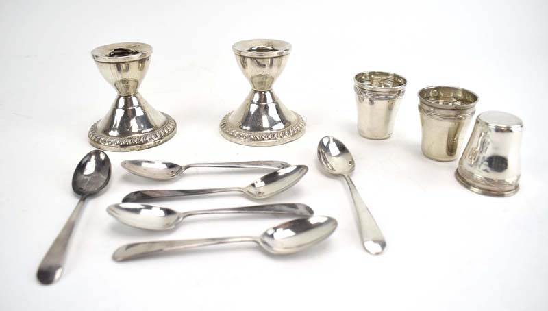 A mixed parcel of silver comprising a pair of dwarf candlesticks, six demitasse spoons, - Image 2 of 3