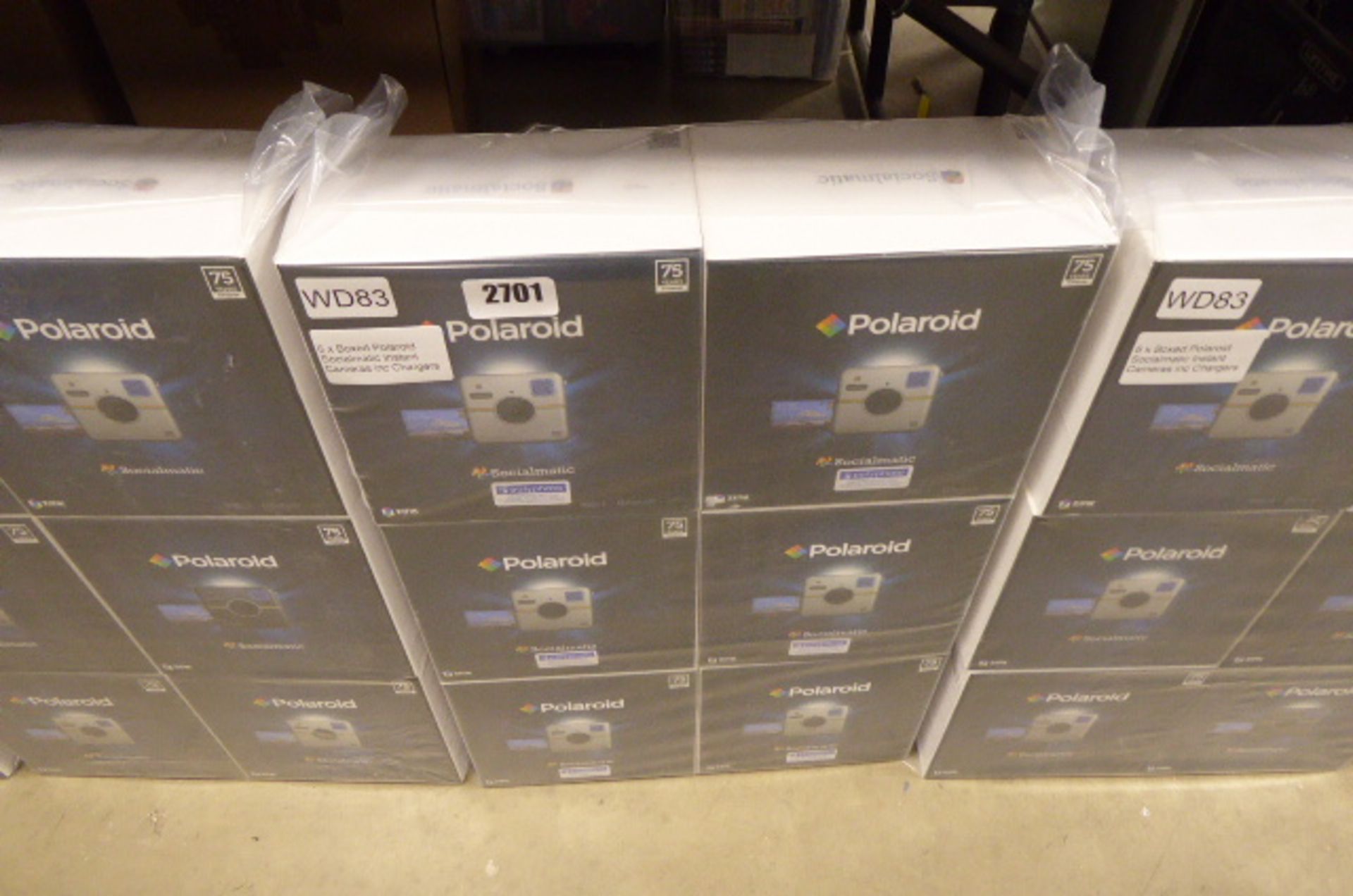 Six boxed Polaroid Sociomatic cameras in sealed bag