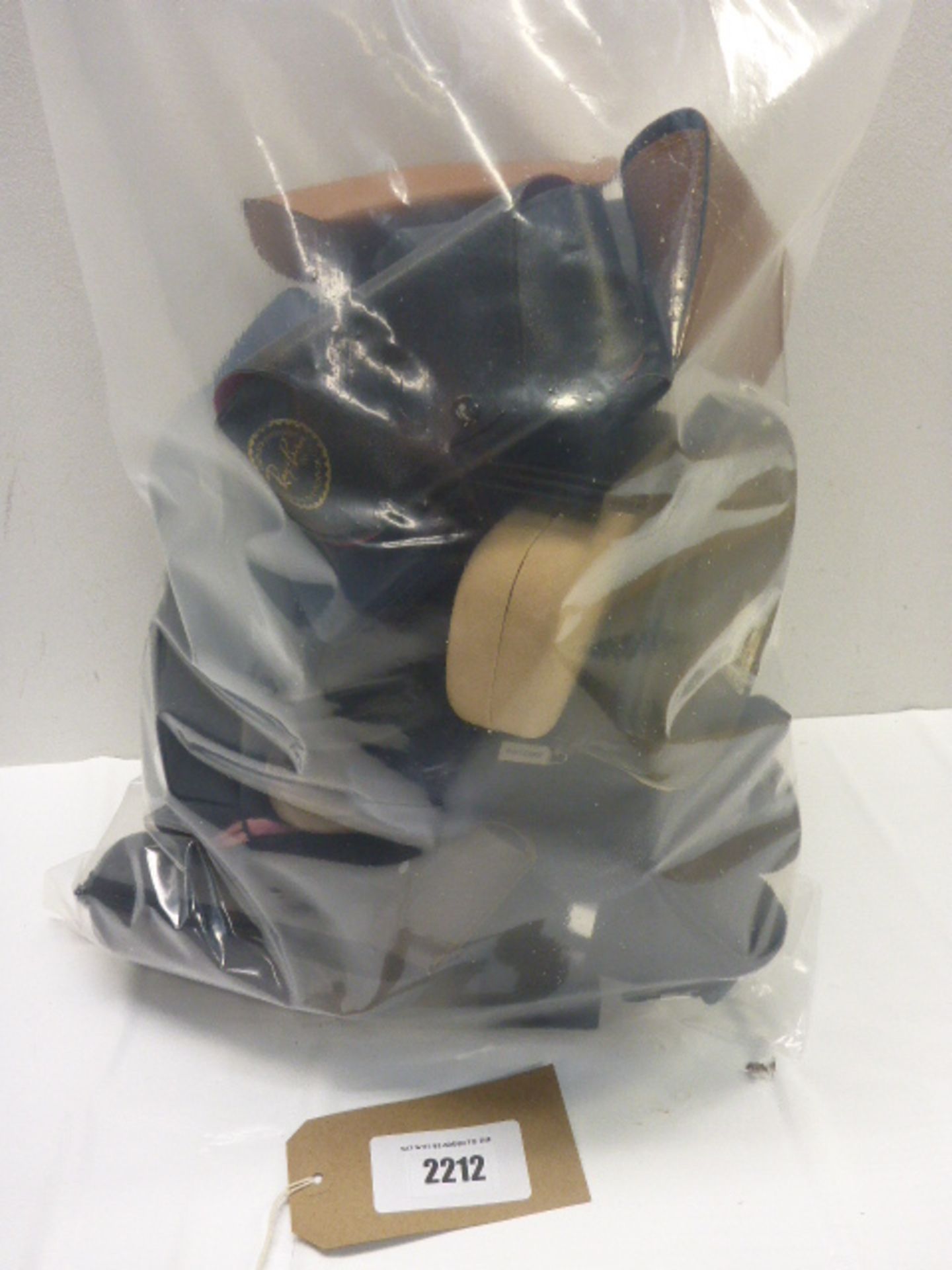 Bag containing quantity of various empty glasses cases