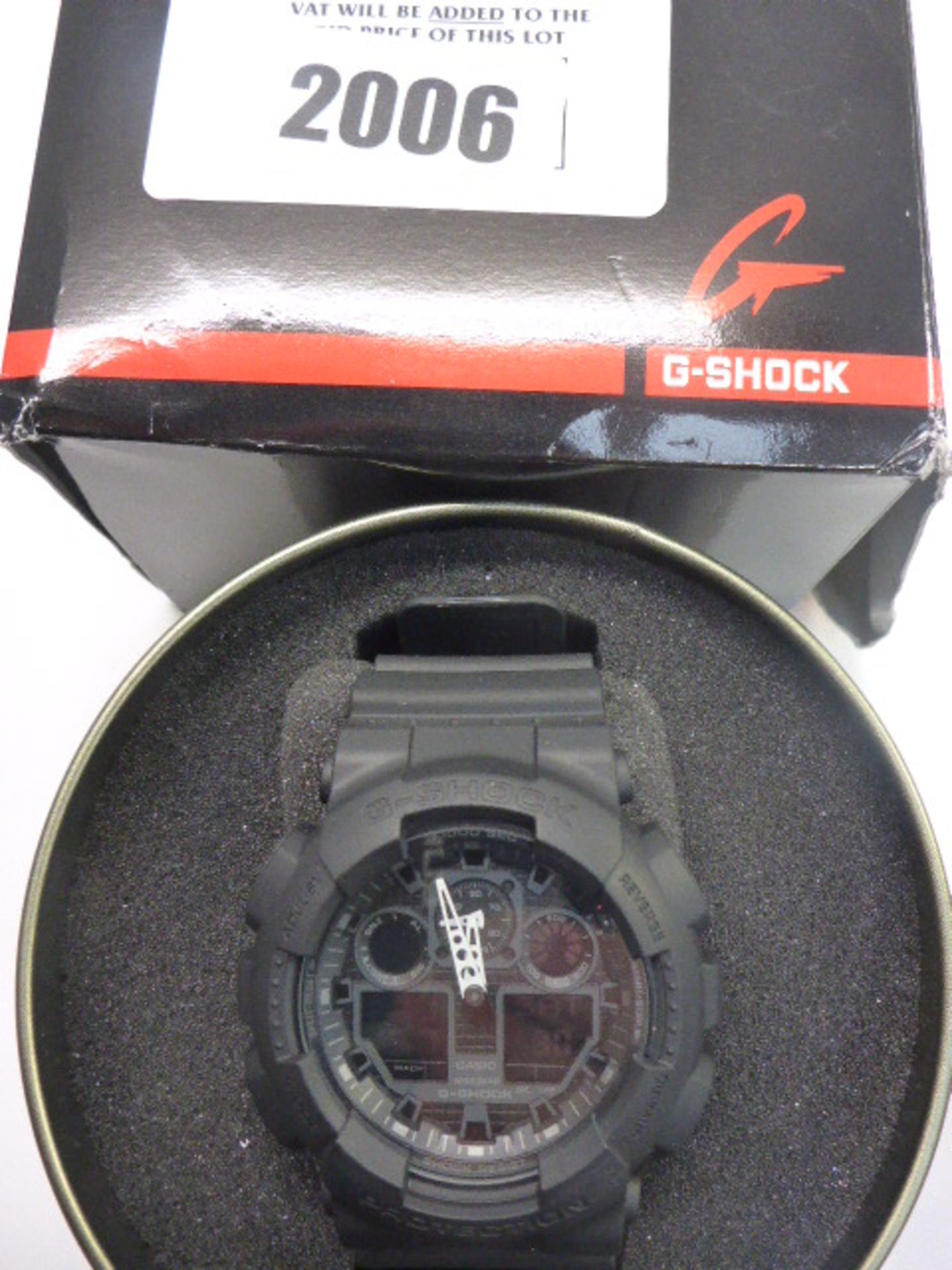 G-Shock GA-100-1A1ER black wristwatch in box