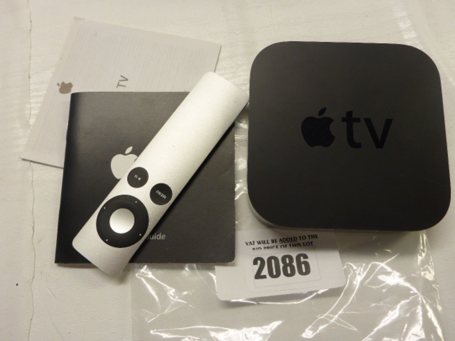 Apple TV box with remote