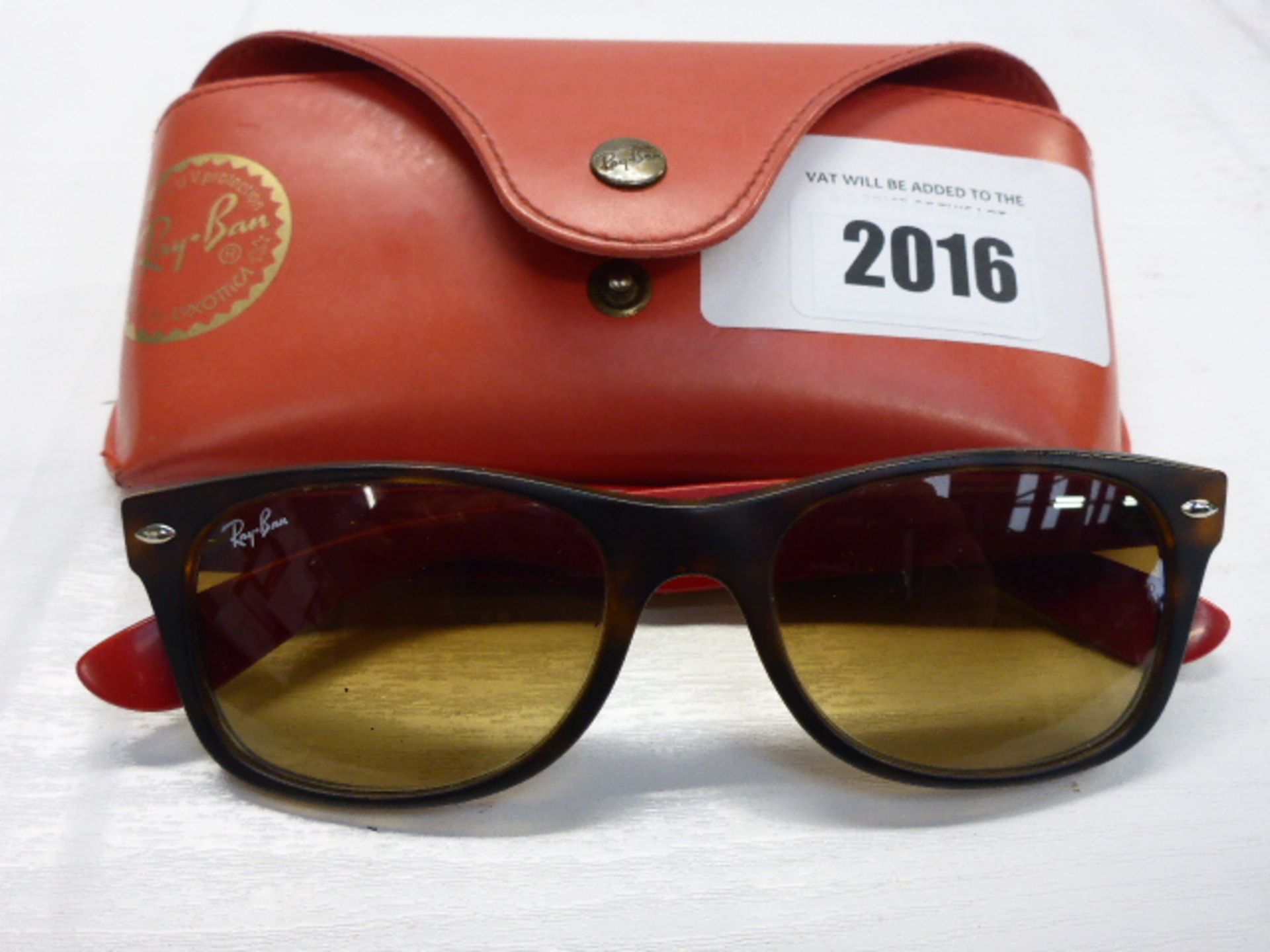 Pair of Ray-Ban sunglasses in red case