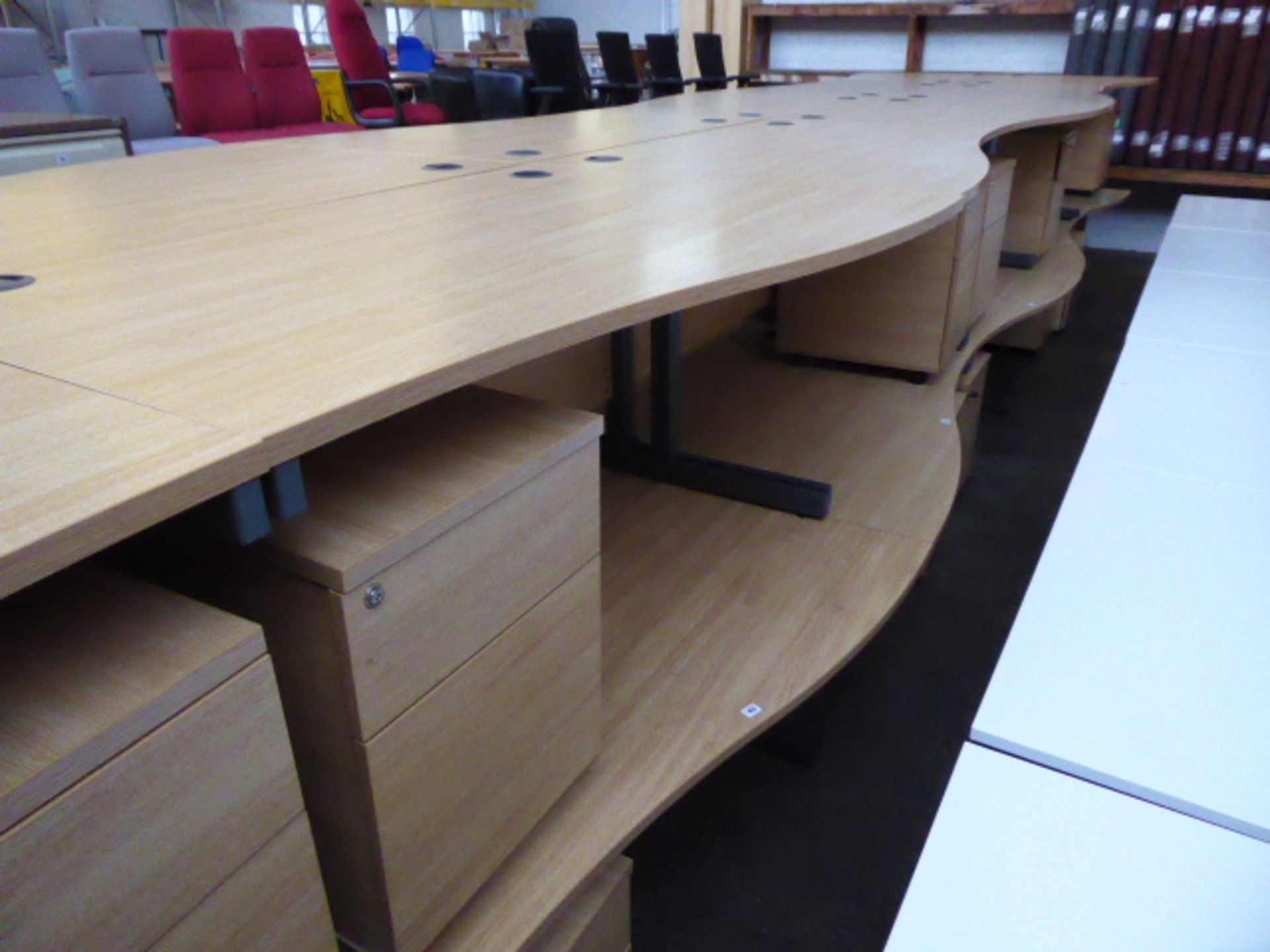 2 140cm light oak effect desks with a wave on cantilever legs and 2 matching pedestals with matching