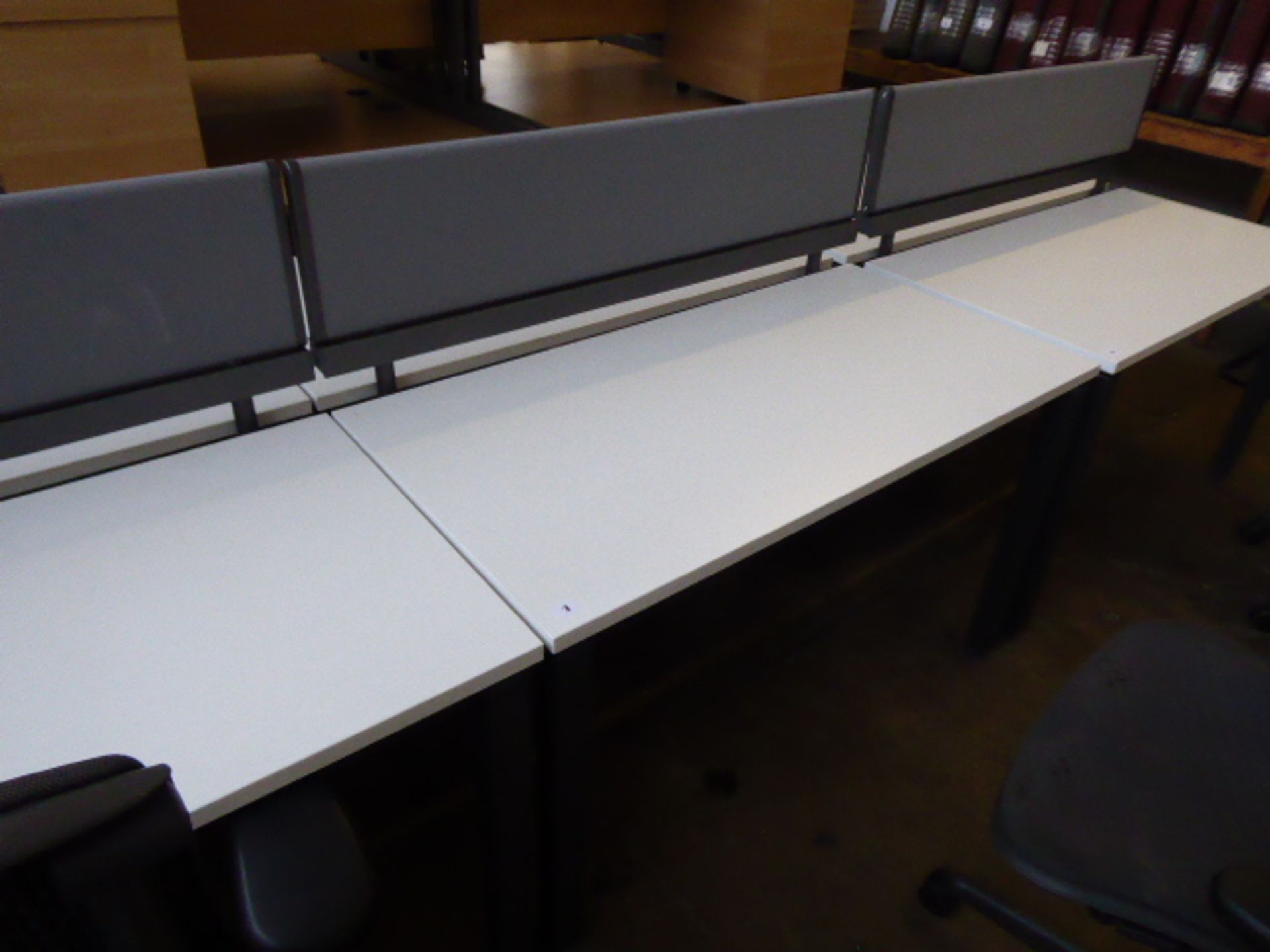 A double Herman Miller workstation with a single privacy screen (120cm wide) each with a 3 drawer