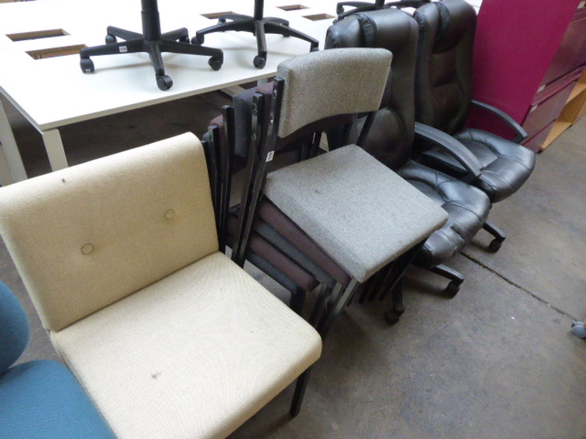 2 black leather effect office chairs, stack of cloth chairs and 2 non matching cloth chairs