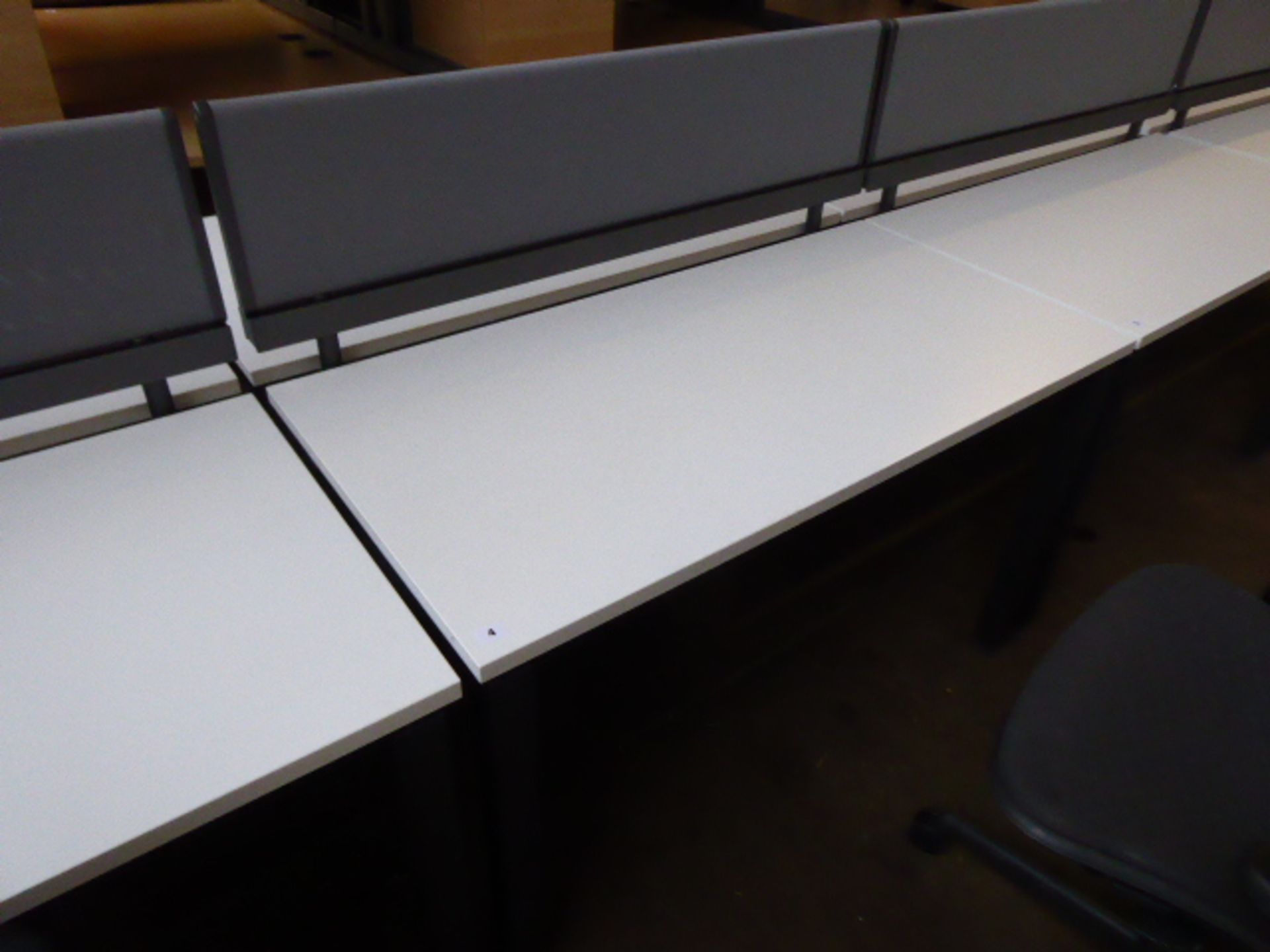 A double Herman Miller workstation with a single privacy screen (120cm wide) each with a 3 drawer