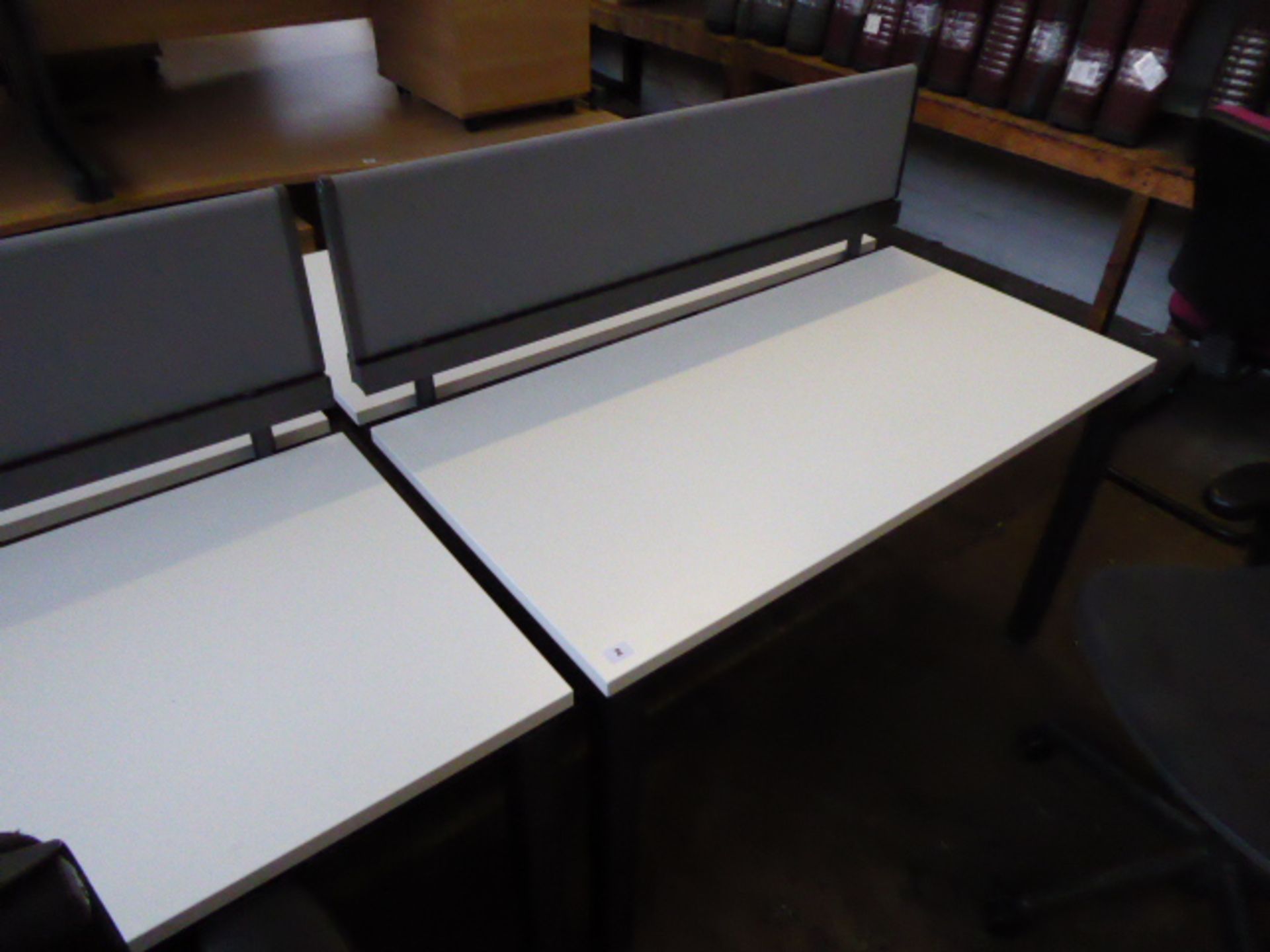 A double Herman Miller workstation with a single privacy screen (120cm wide) each with a 3 drawer