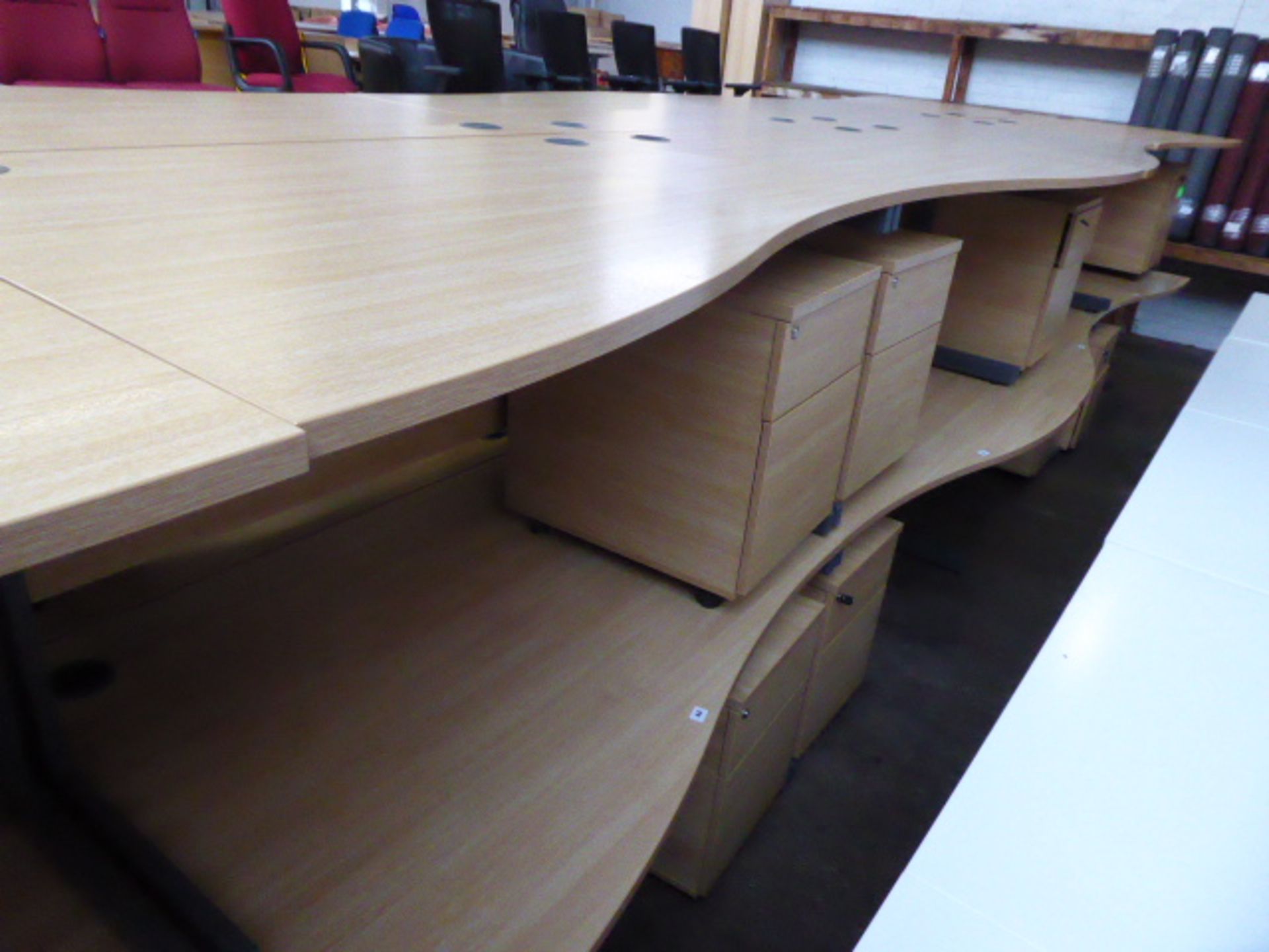 2 140cm light oak effect desks with a wave on cantilever legs and 2 matching pedestals with matching