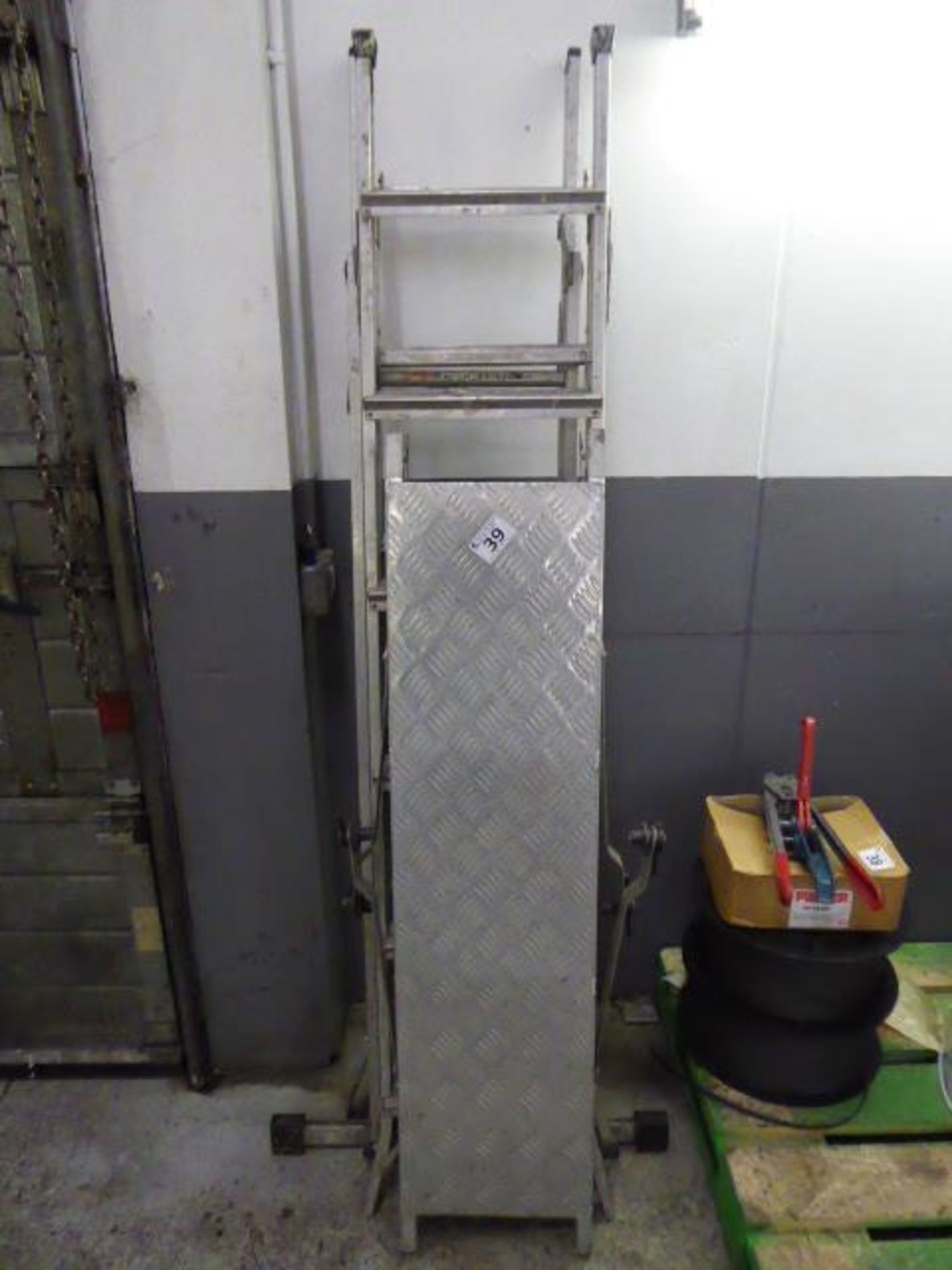 2 aluminium folding ladders, one with platform