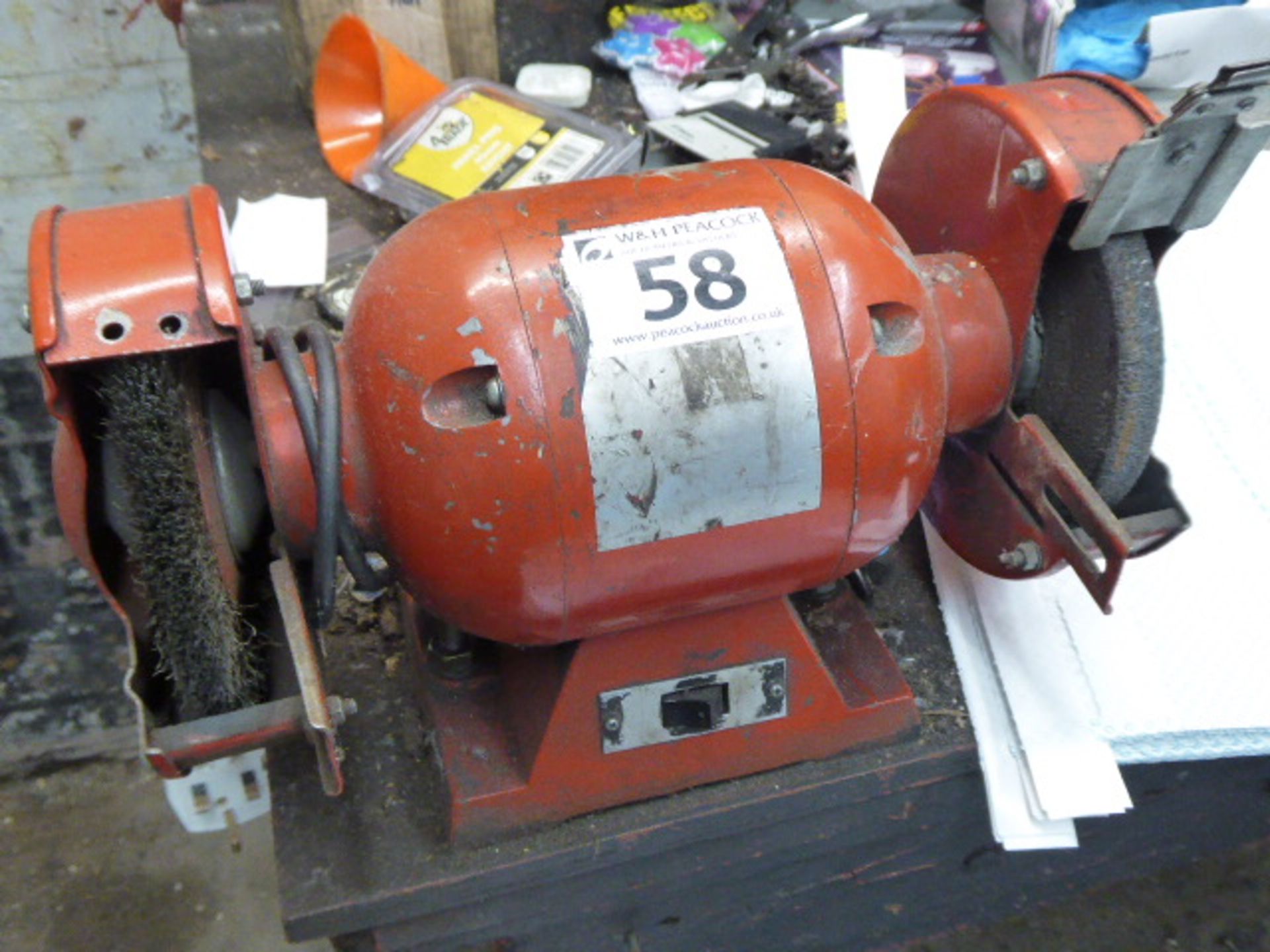 Double ended bench grinder with bench