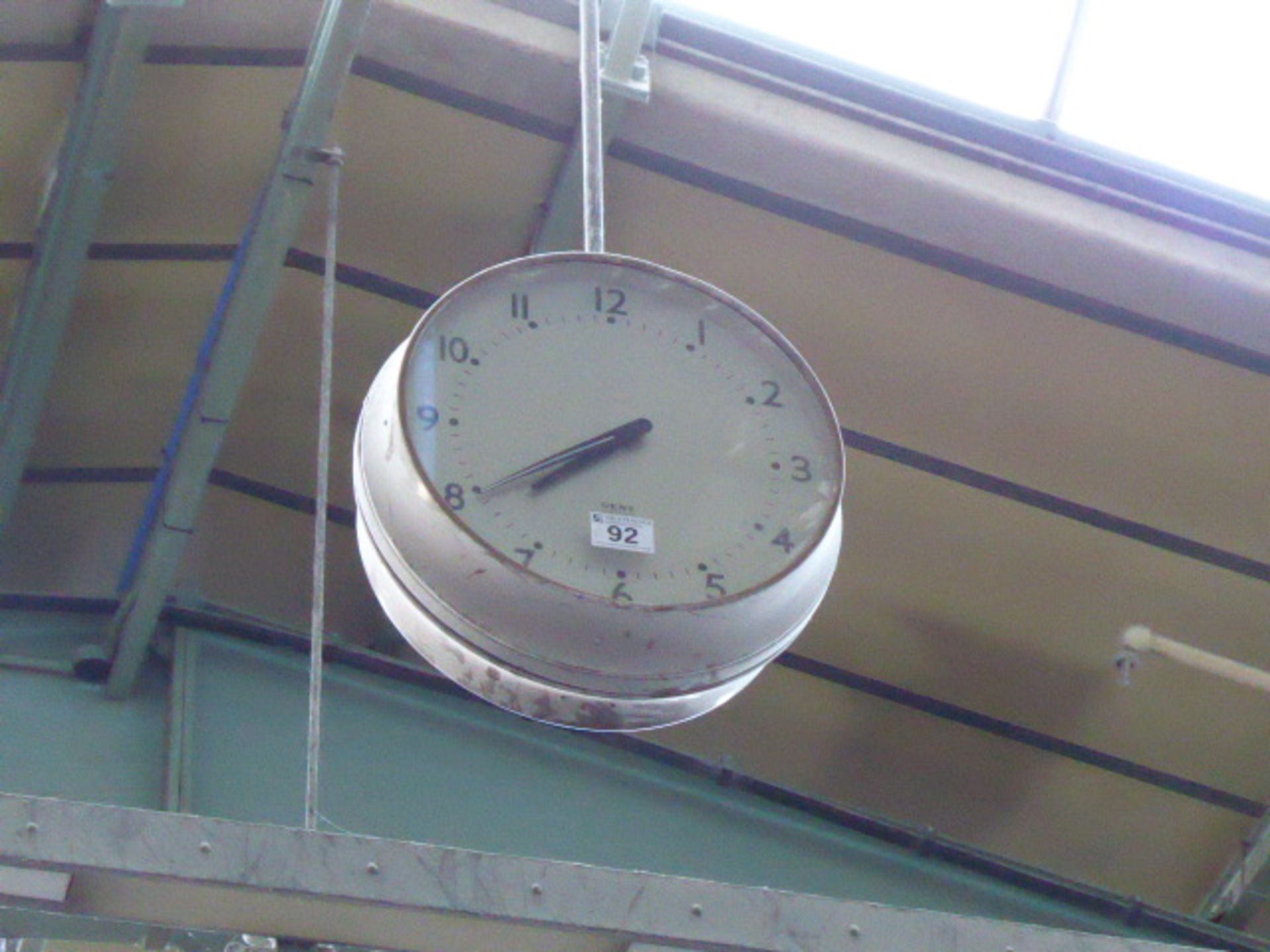 Gent double sided ceiling mounted factory clock together with a similar wall mounted clock