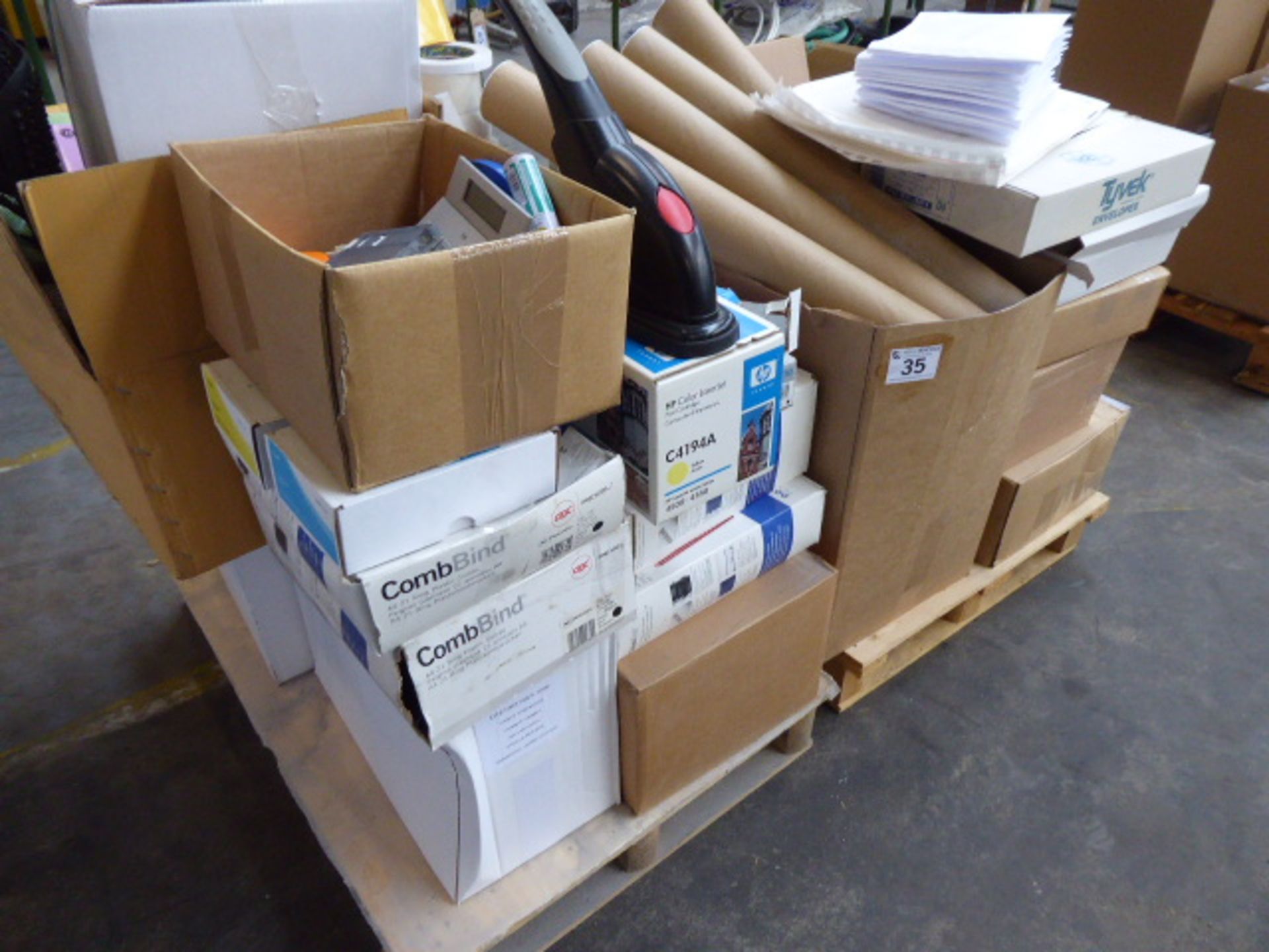 2 pallets of misc. stationary to include envelopes, ring binders, staplers, combi-bind, elastic