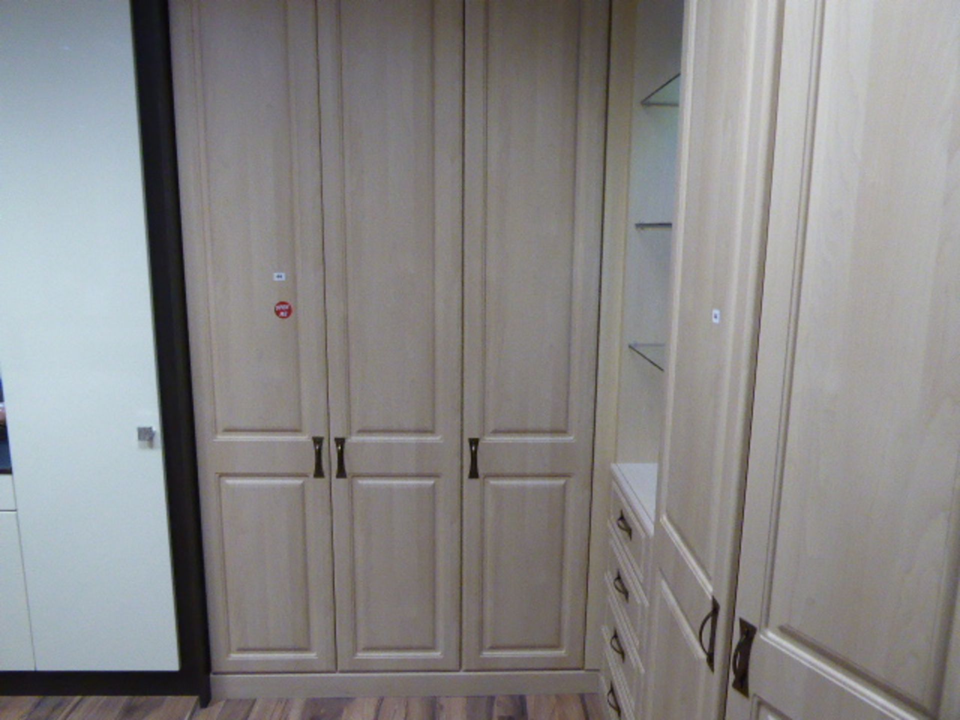 Small corner built in bedroom storage unit comprising of cupboards, drawers and open shelves. Max - Image 3 of 3