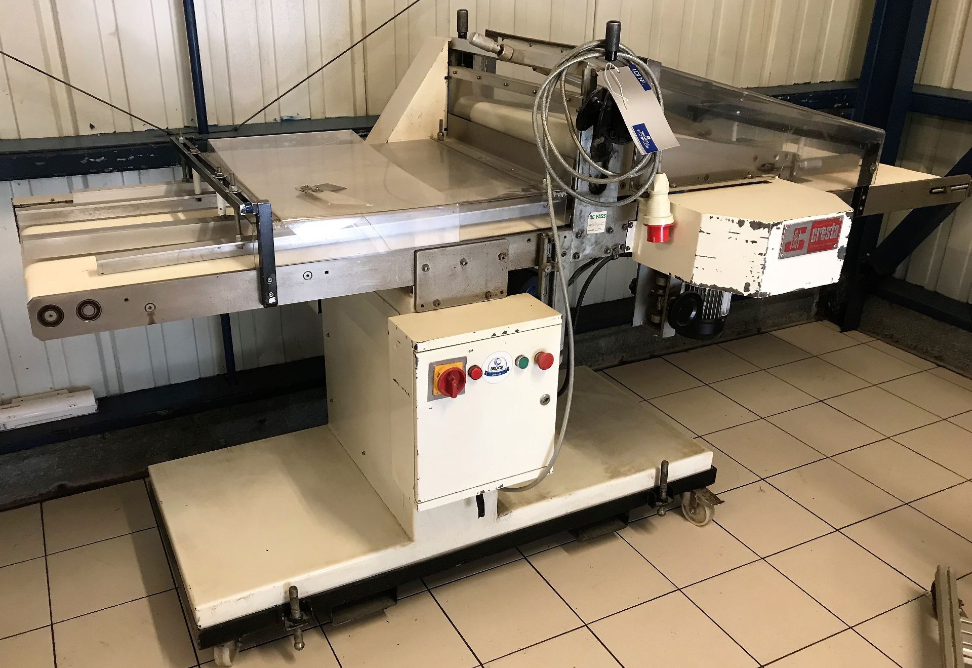 A JC Custance Cresta Automatic Bun Slicing Machine on mobile base (3ph-plug in), 525mm x 625mm top