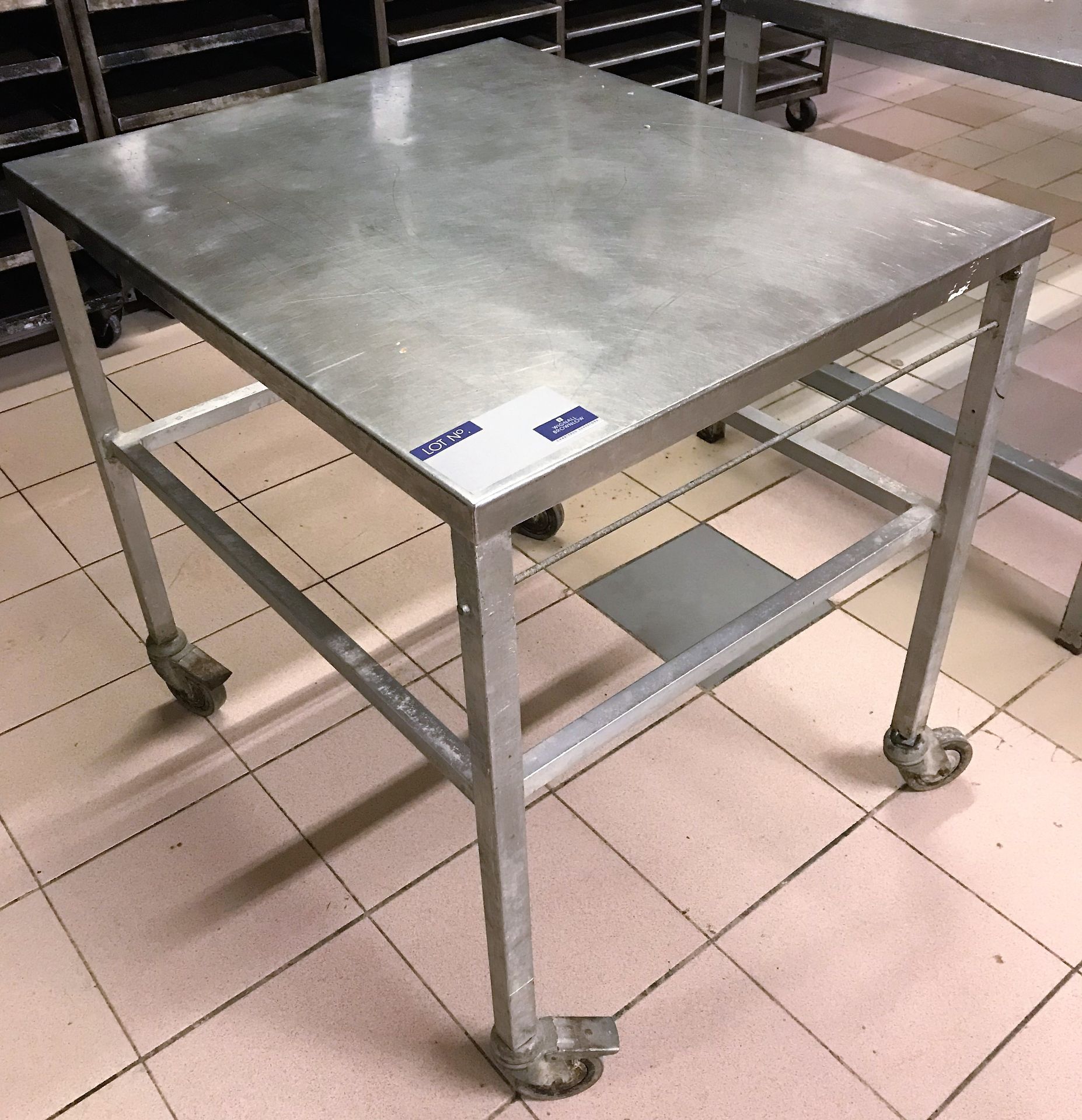 A Mobile Stainless Steel Bench, 33in x 27in x 32in h.