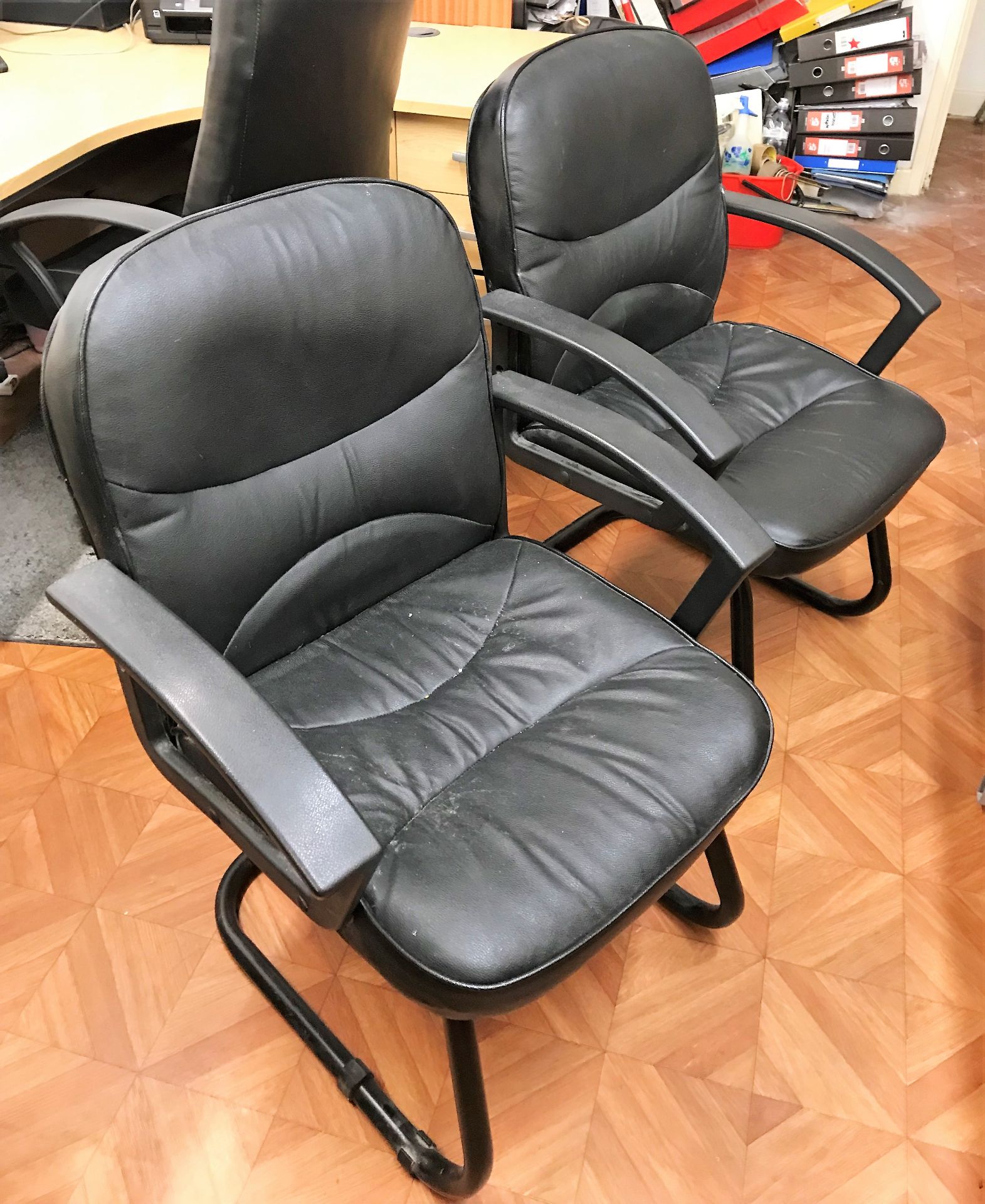 2 Faux Leather Armchairs with Similar Swivel Armchair.