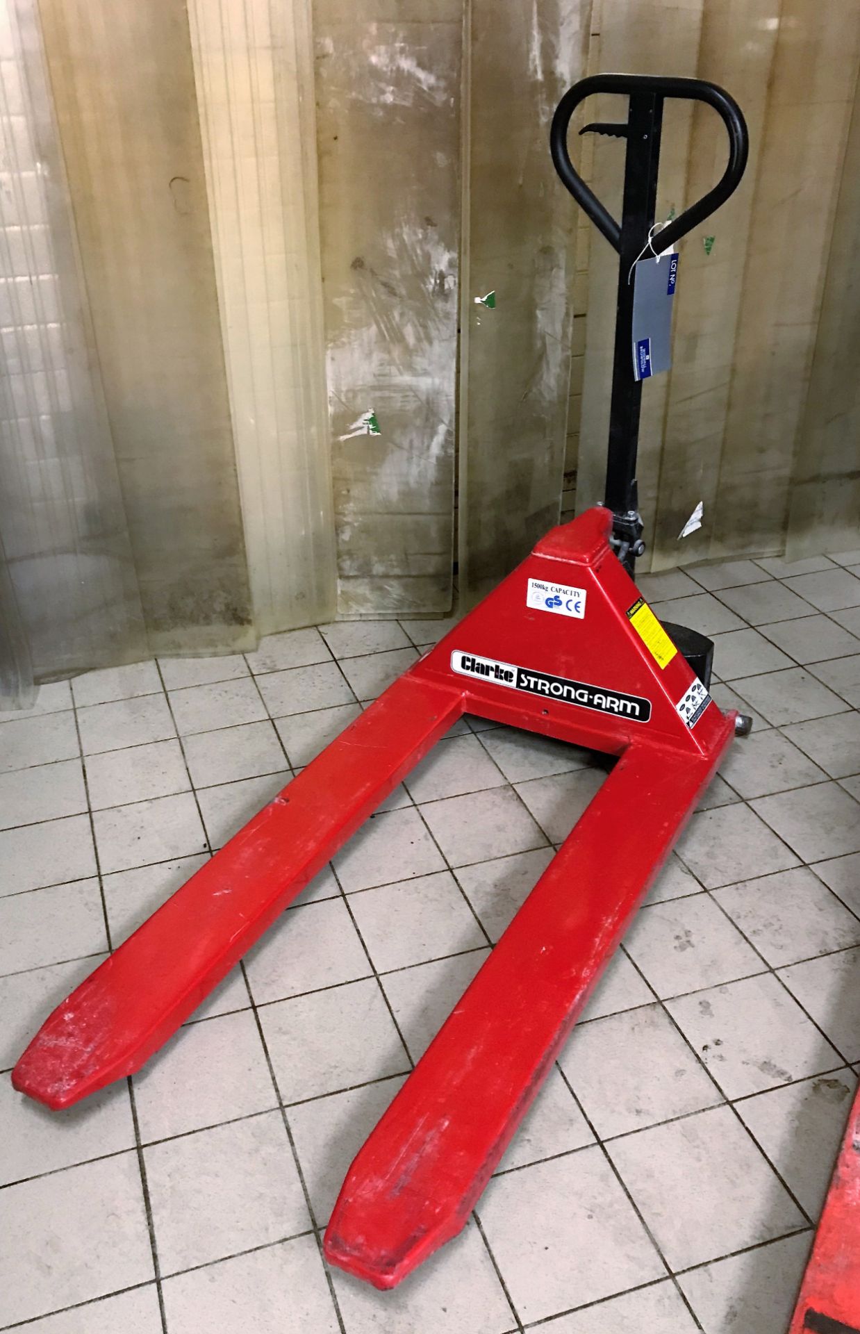 A Clarke Strong-Arm Hand Hydraulic Pallet Truck, 1500kg capacity.