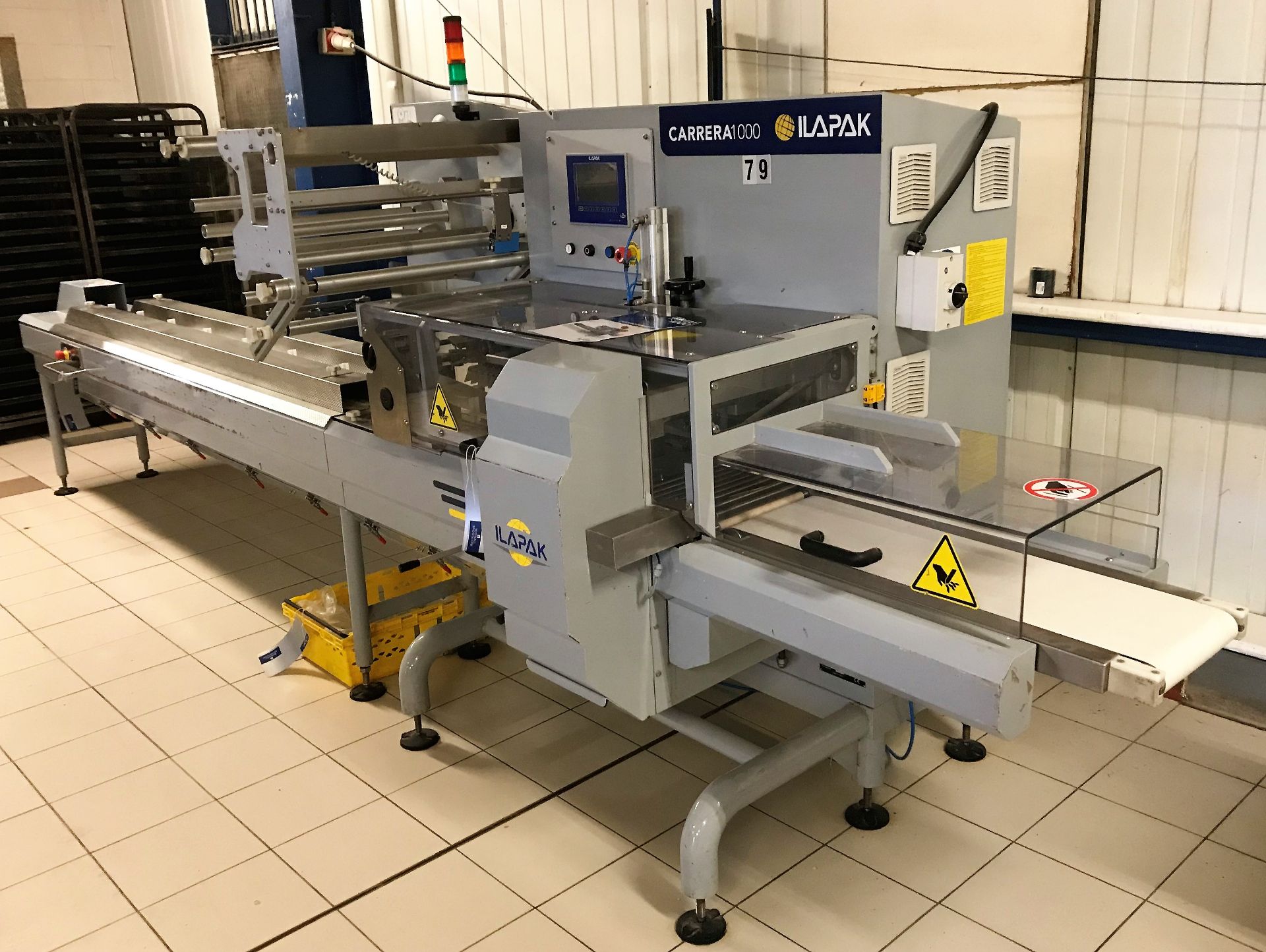 An Ilapak Carrera 1000 Restyling Flow Wrapping Machine No.0642220175 (2017), 3ph-plug in; infeed