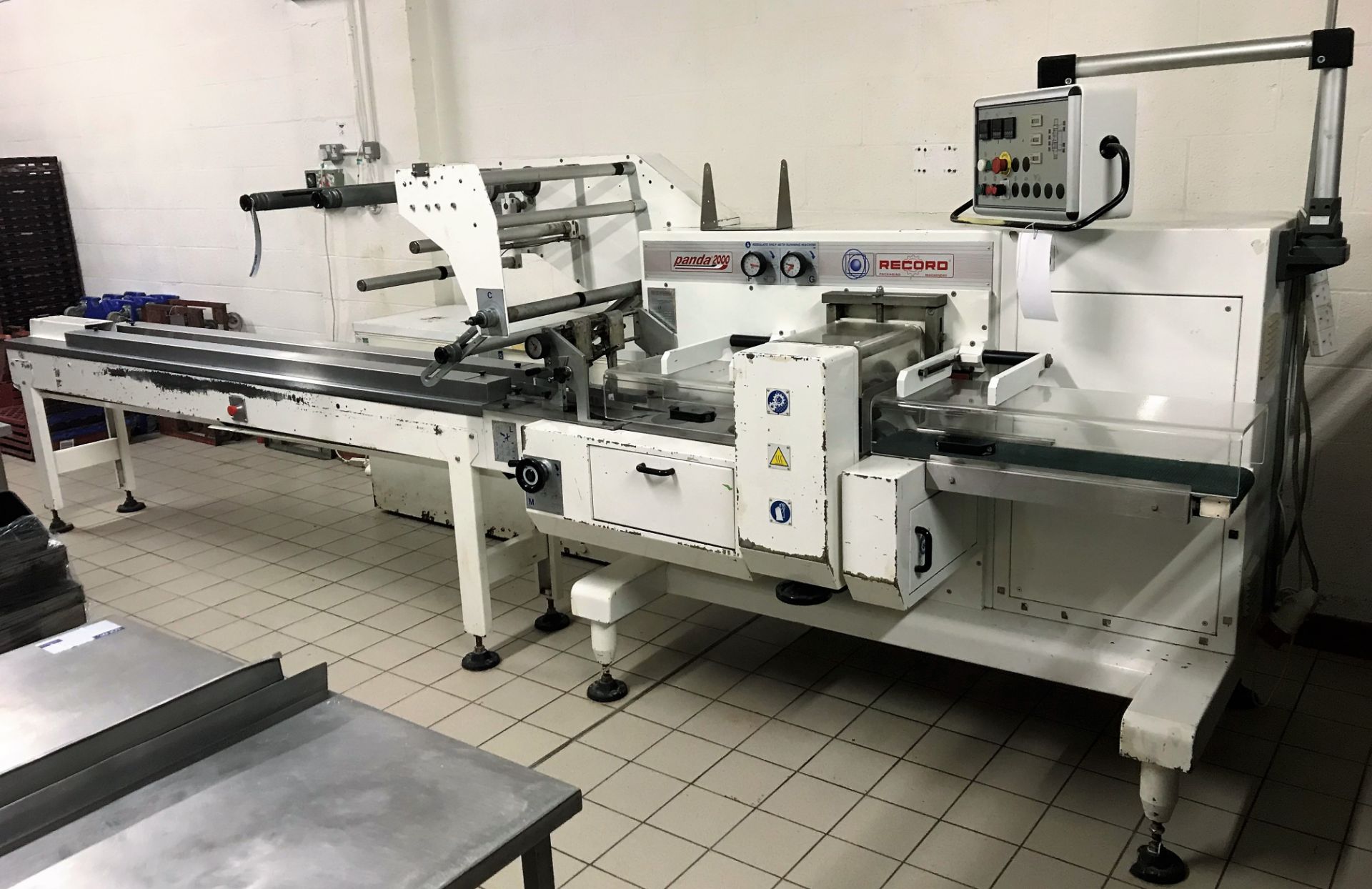 A Record Panda 2000 Flow Wrapping Machine No.11-99-502 (2000), 3ph-plug in; indicated 478.4 hours;