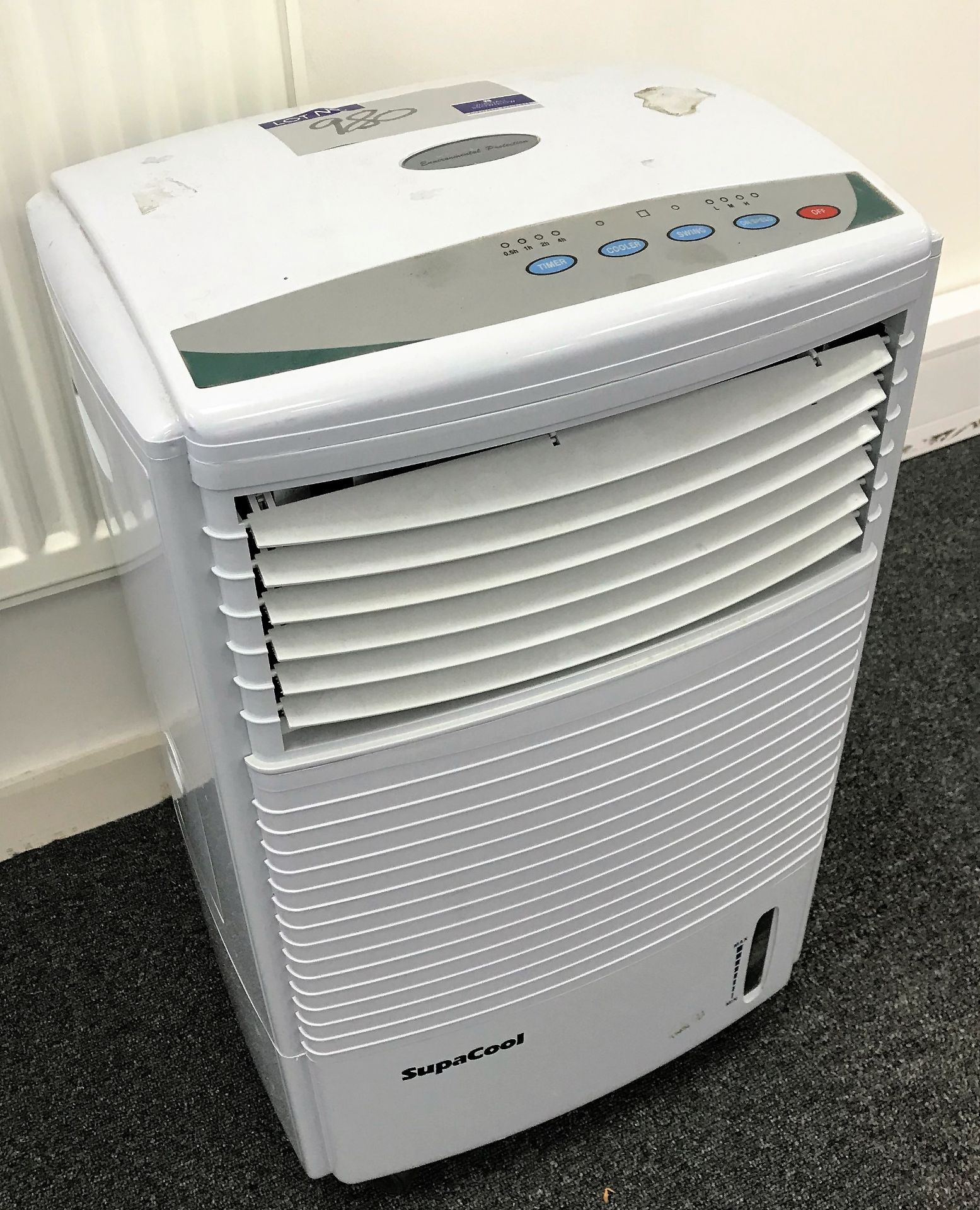 A SupaCool SCAC1A Mobile Air Conditioning Unit with remote controller.