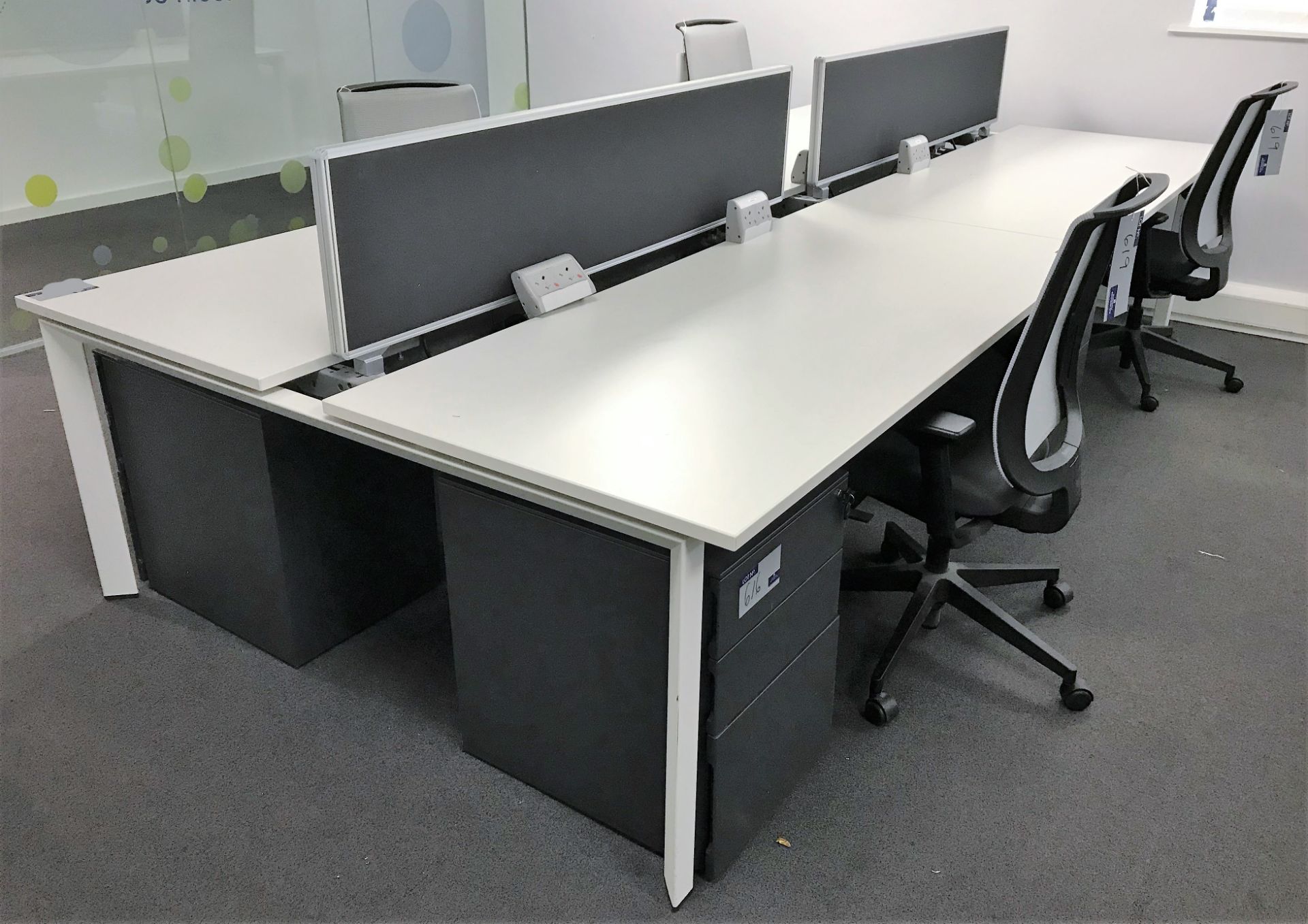 A Steelcase Model WP3G12801 4 position Modular Workstation with 2 Dividers, Integral Cable Trays,