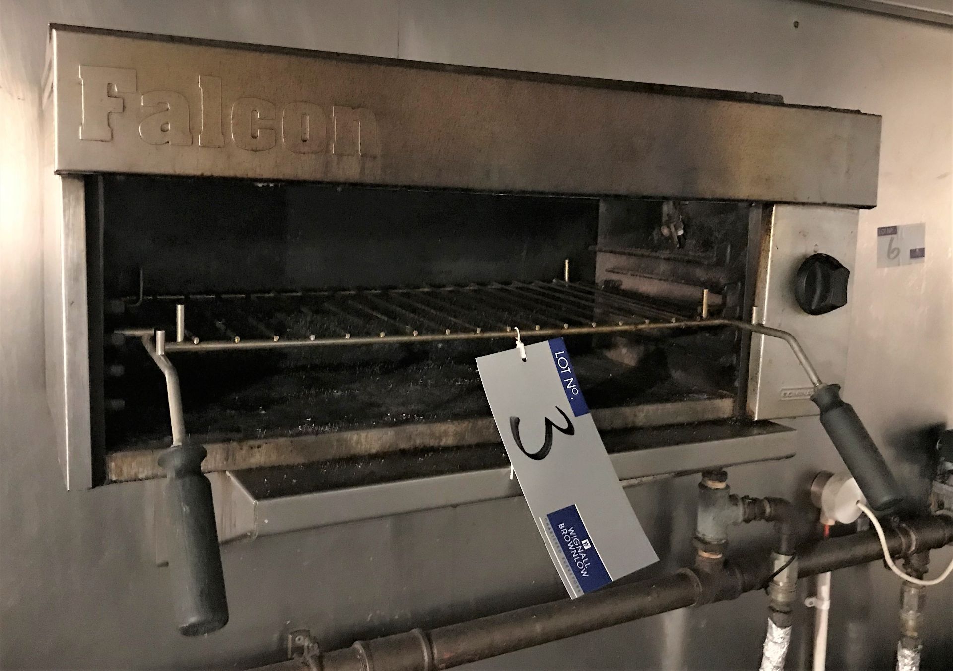 A Falcon Dominator Eye Level Gas Grill, 22in w.