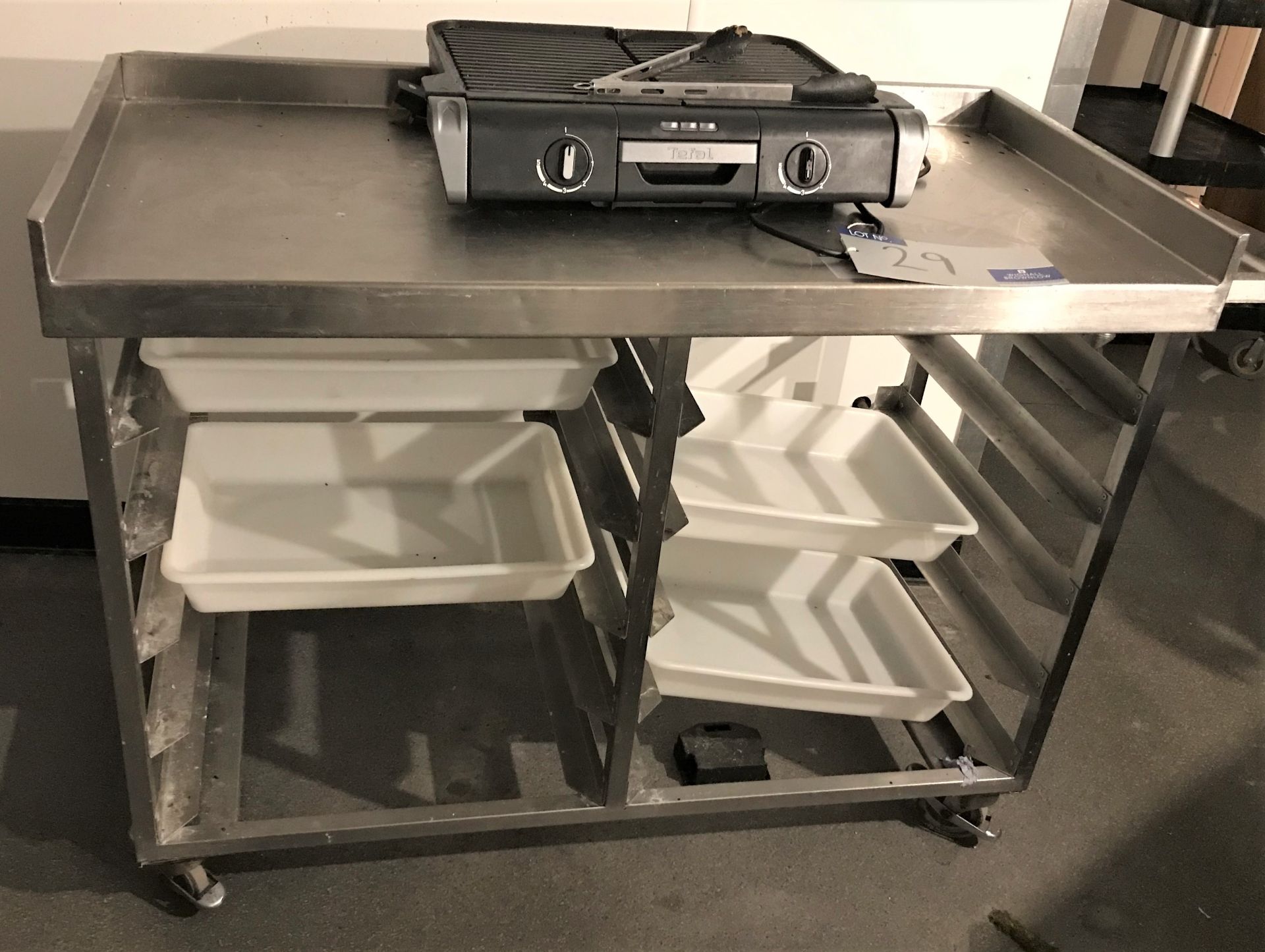 A Mobile Stainless Steel Bench/Multi Tier Tray Sta