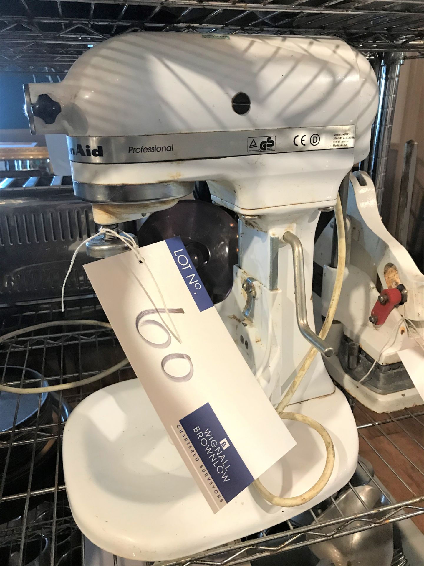 A Kitchen Aid Professional Food Mixer (no bowl).